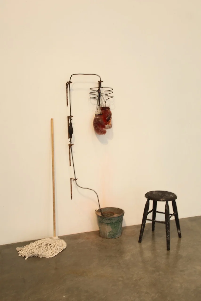 Alison Saar Black Lightening, 2012 Glass, shoestrings, found mop and bucket and water 58 x 24 x 24 inches Courtesy of the Artist and LA Louver