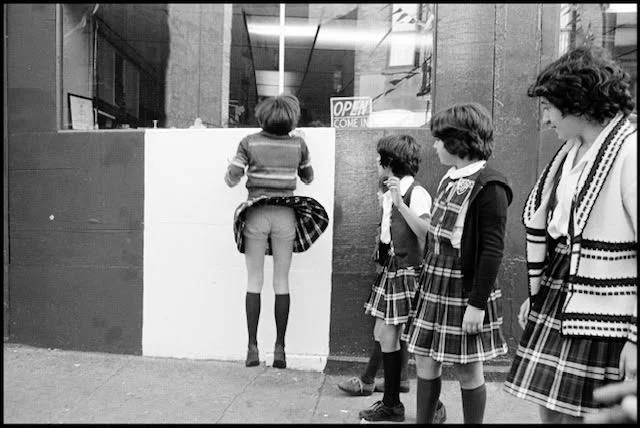 Susan Meiselas After school on the corner of Prince and Mott Streets, Little Italy, New York, 1976 Silver gelatin print 18 x 24 inches (Framed) Courtesy of the artist and the Higher Pictures, New York