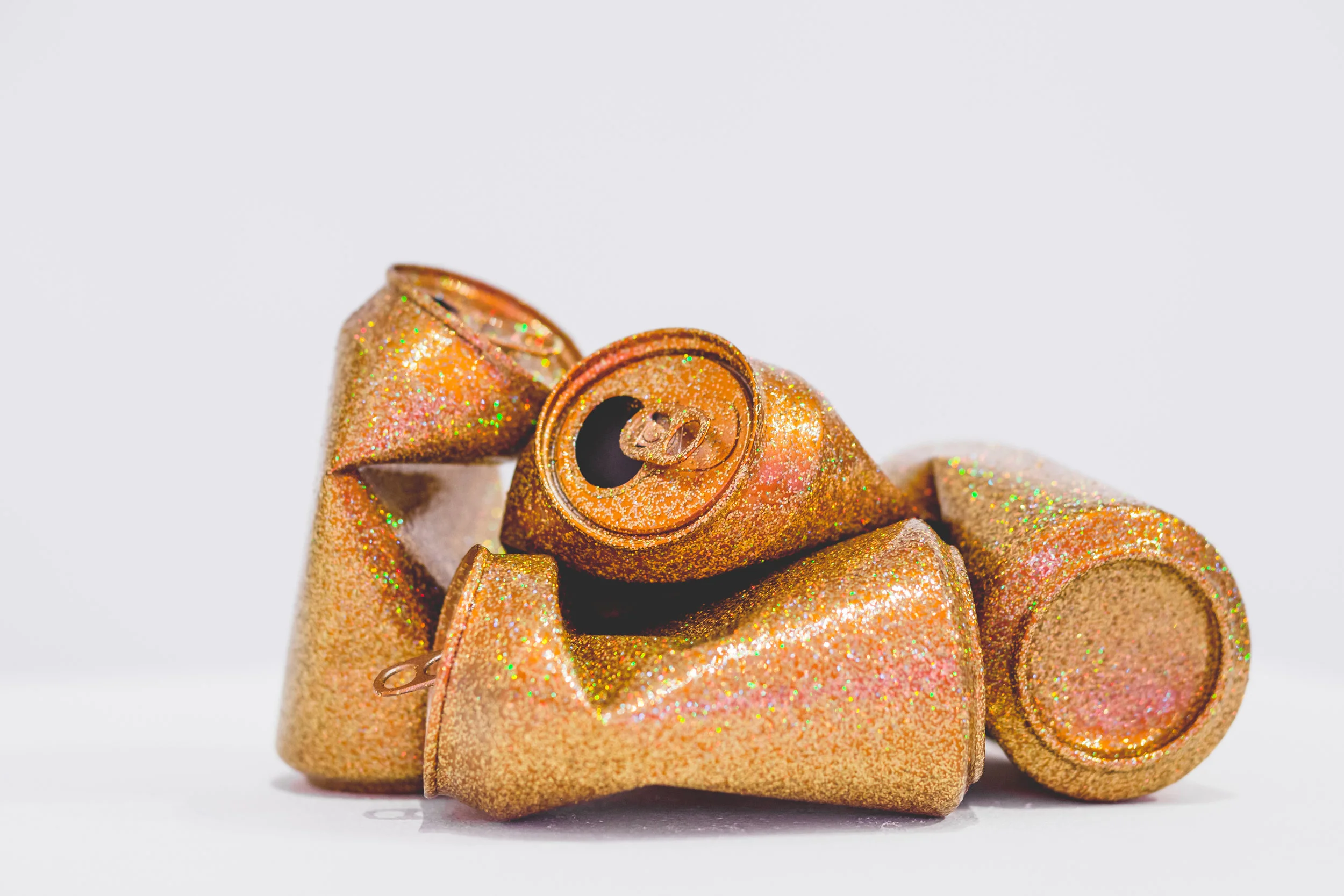 Sadie Barnette Untitled (Can) (Gold), 2018 Metal flake on found cans Approx. 4.75 x 3 x 3 inches (each) SB103