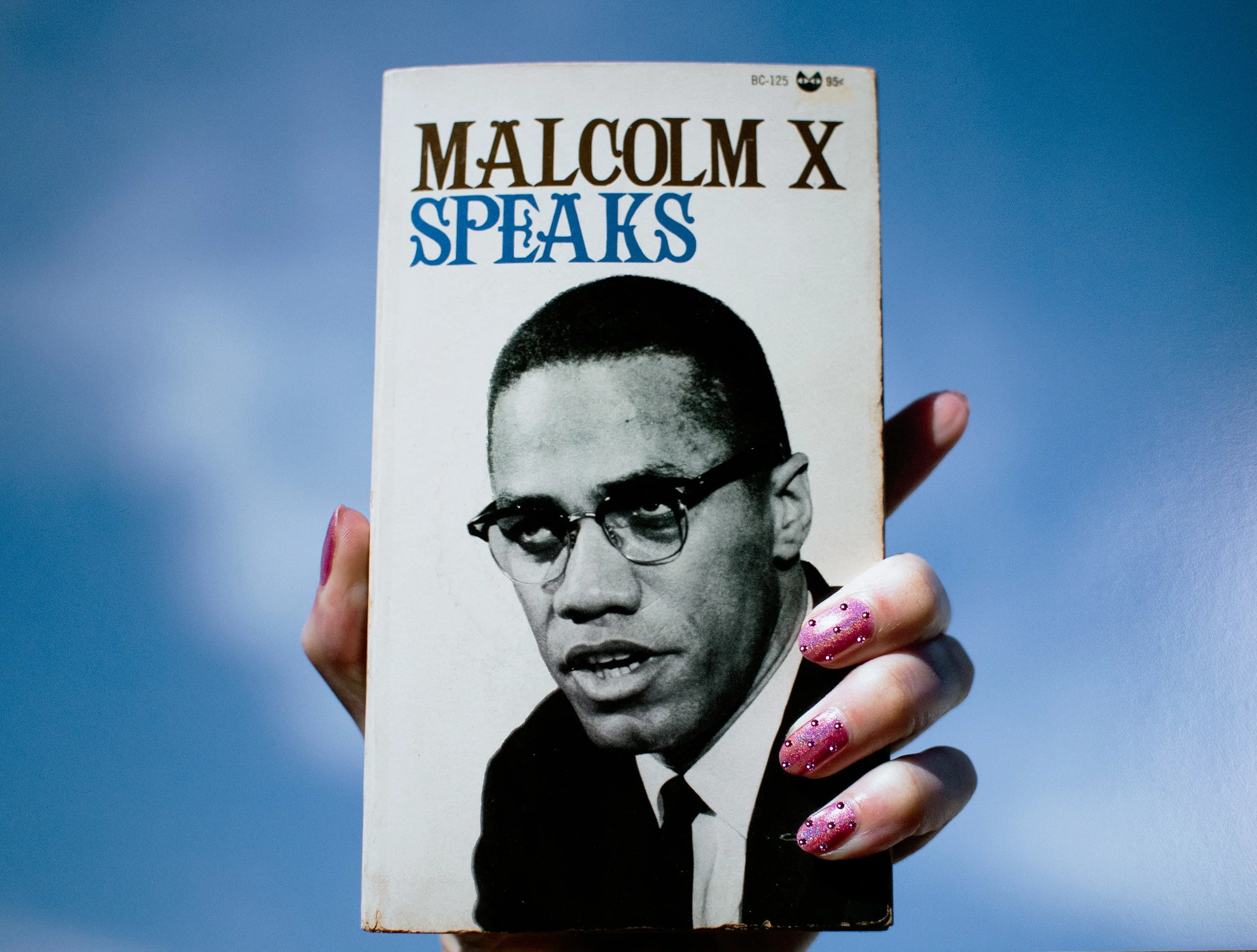 Sadie Barnette Untitled (Malcolm X Speaks), 2018 Archival pigment print and Swarovski crystals Unframed: 37.5 x 50 inches Framed: 38.25 x 50.75 inches SB129