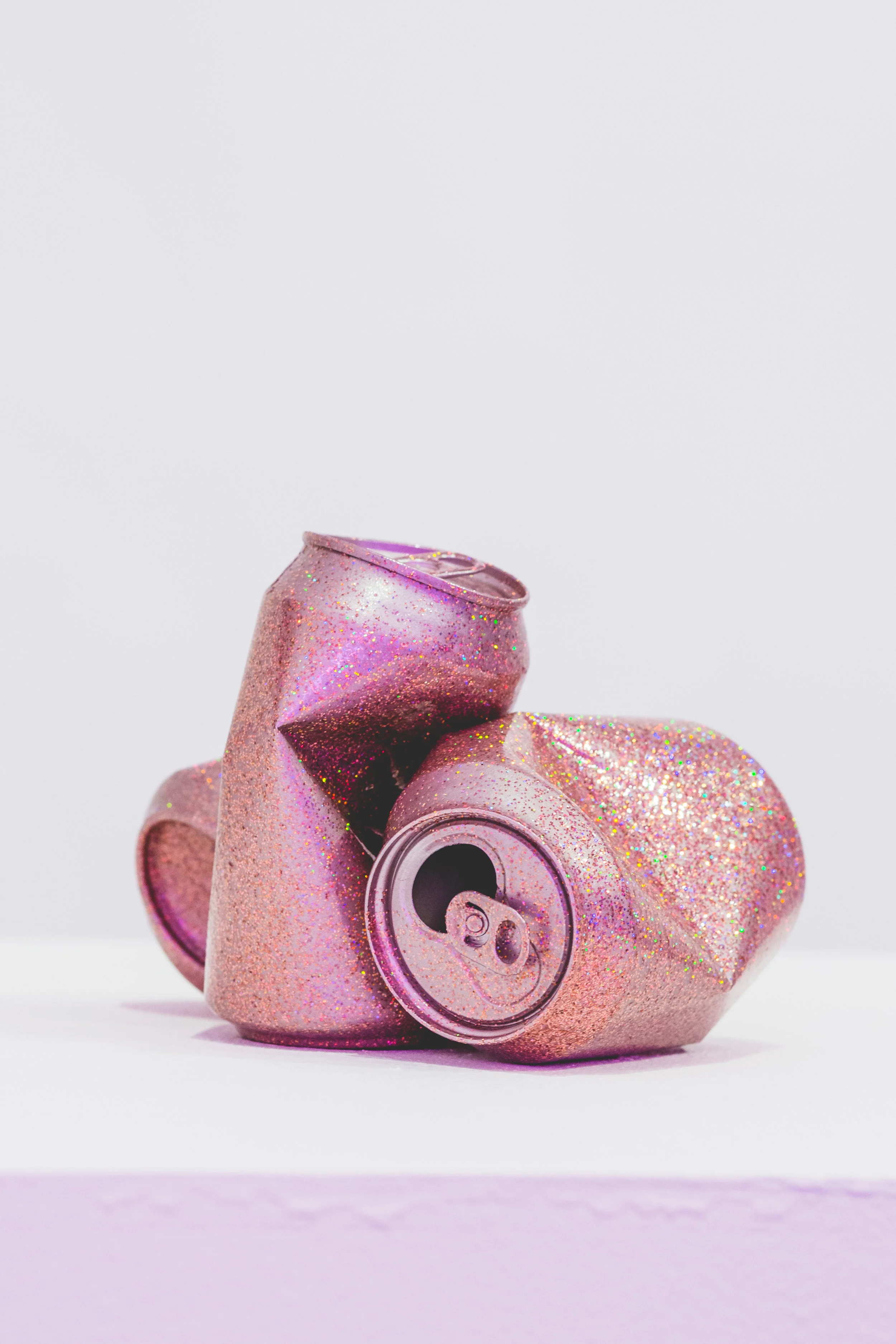 Sadie Barnette Untitled (Can) (Pink), 2018 Metal flake on found cans 4.75 x 3 x 3 inches