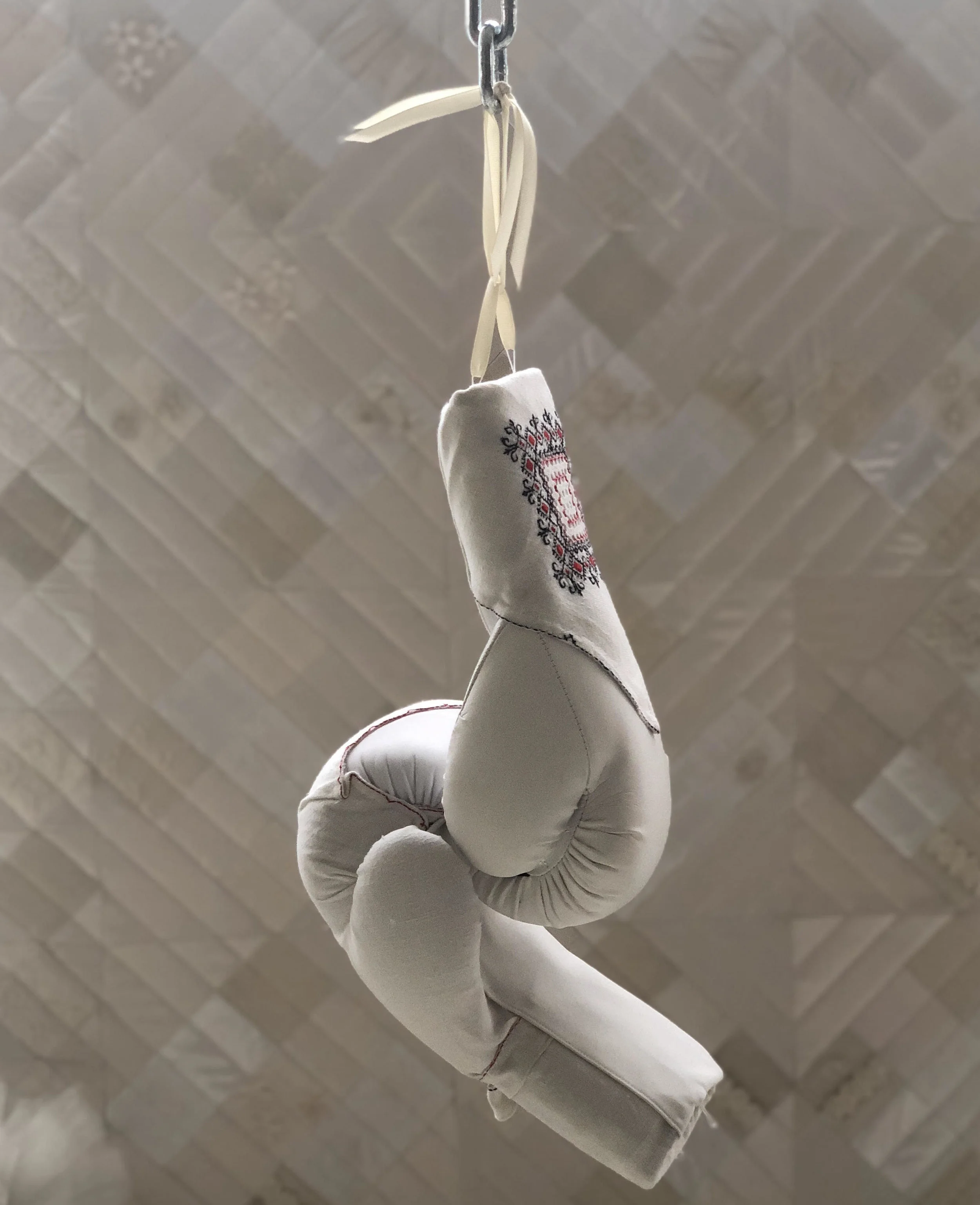 Zoë Buckman Held, 2018 2 boxing gloves, vintage linen, and chain 18 x 12 x 12 inches