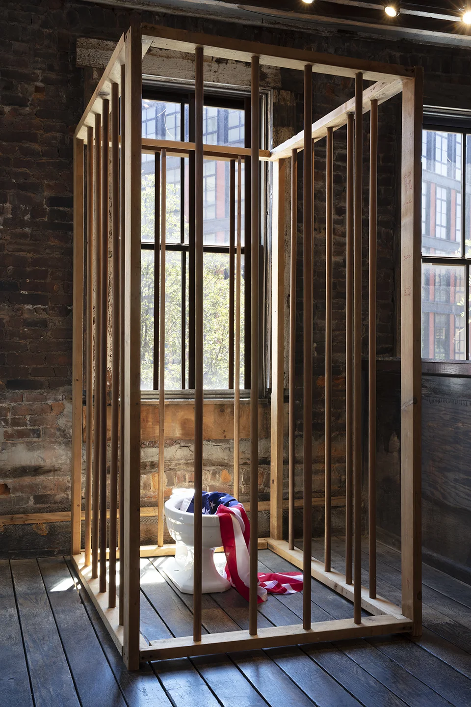 Kate Millet American Dream Goes to Pot, 1970 Wood, porcelain toilet, and nylon flag 96 x 48 x 60 in.