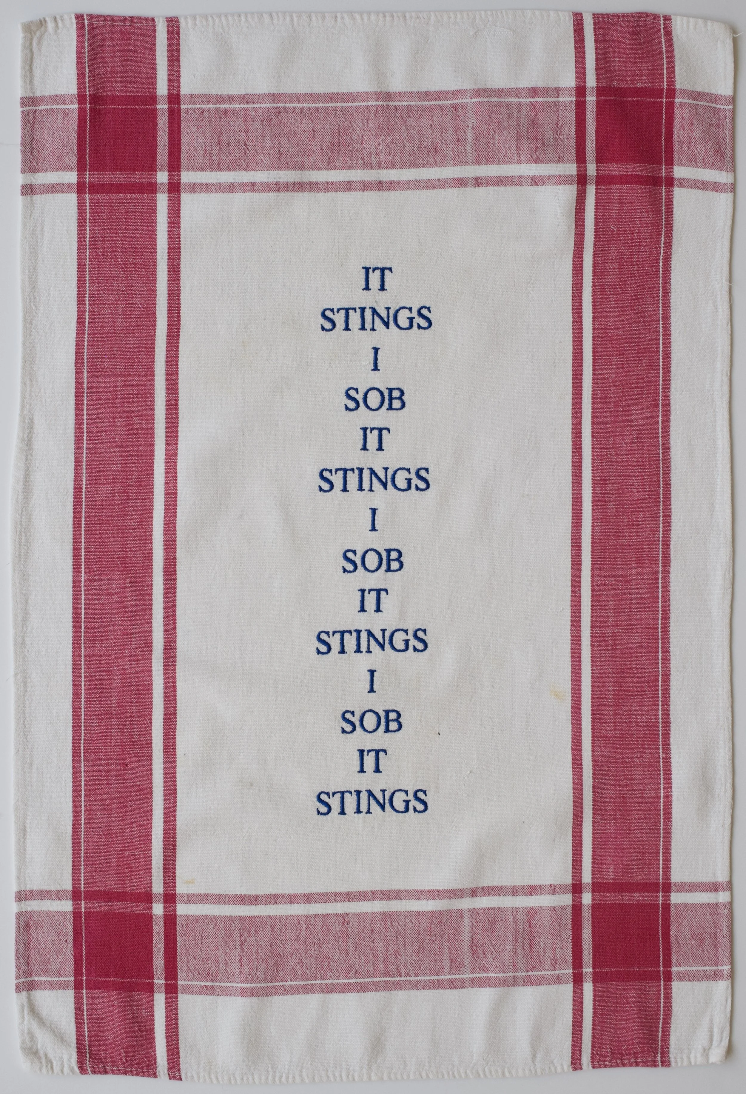 Zoë Buckman Fool, 2018 Embroidery on vintage linen tea towel 24 1/4 x 16 inches Framed 27 1/2 x 19 1/4 inches