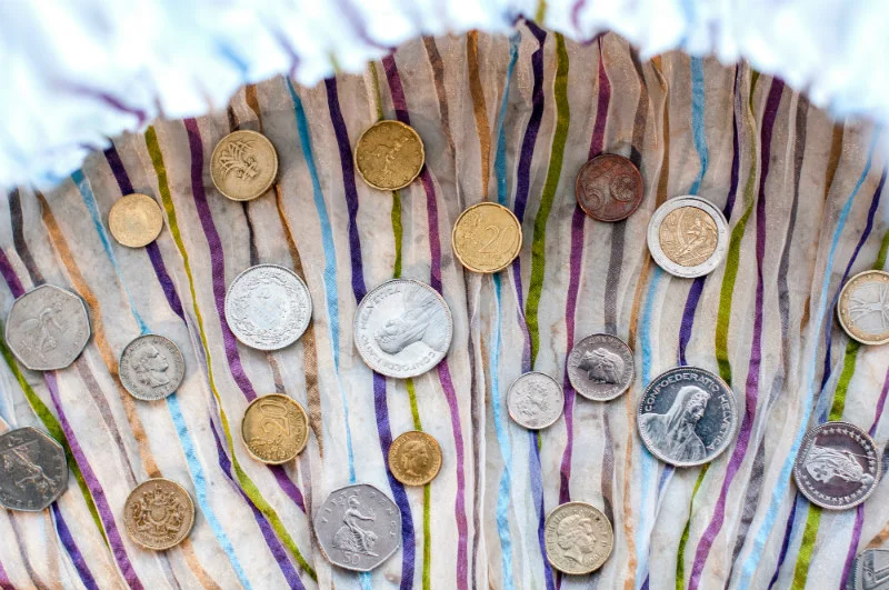 traveling-on-a-budget-coins-currency.jpg