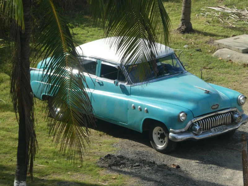 traveler-review-visiting-cuba-hugh-blue-vintage-car.jpg
