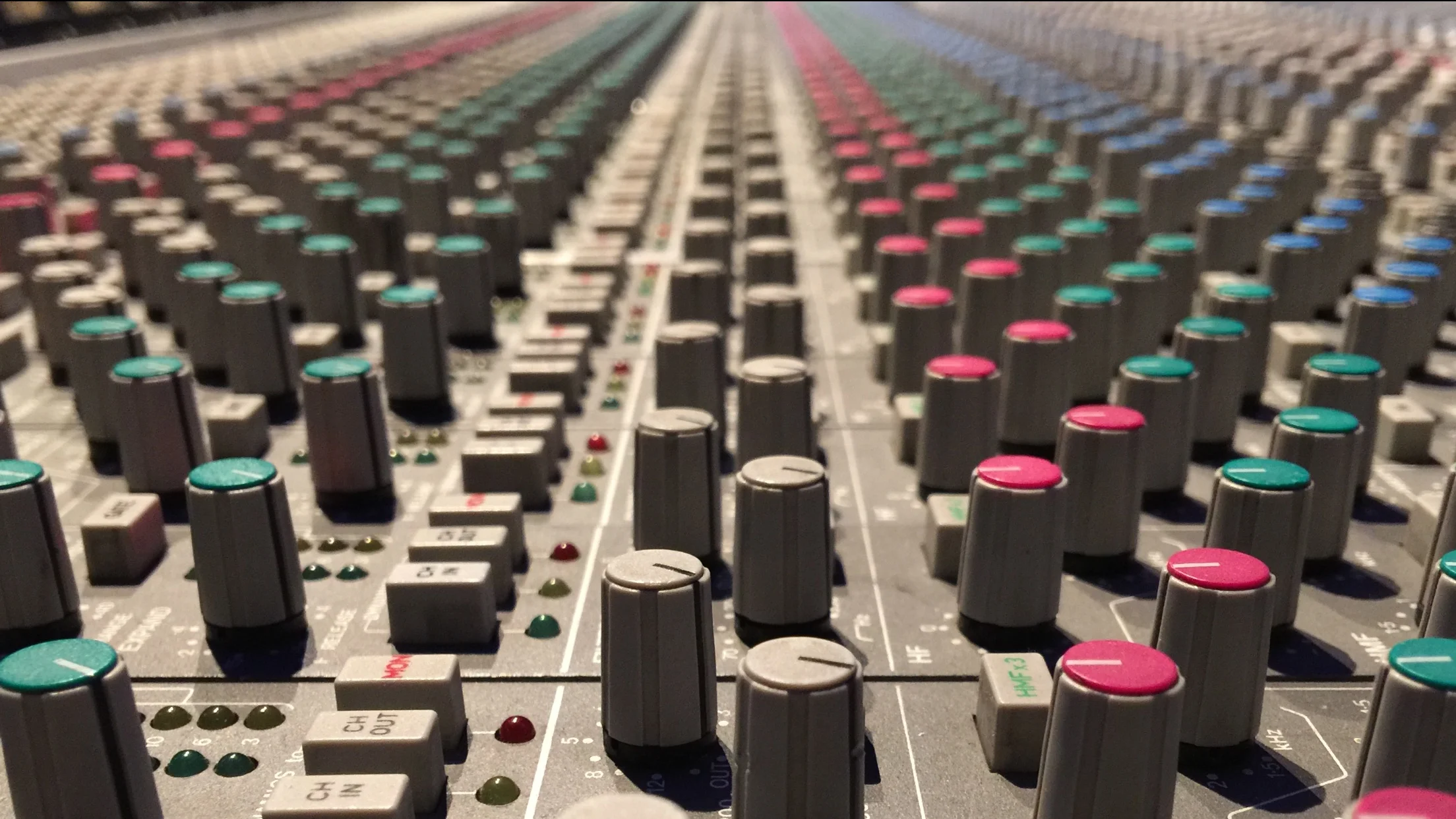 High Pass Filters and Low Pass Filters above the EQ section on an SSL console.