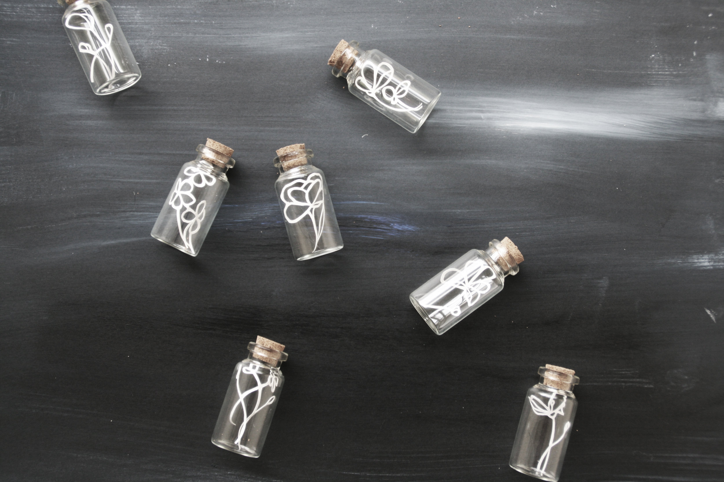 paper cut bottles 2.jpg