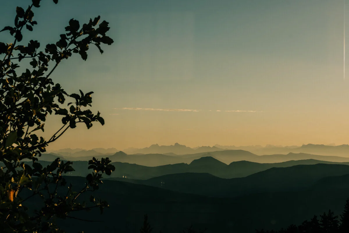 view over rolling hills in greens and blues