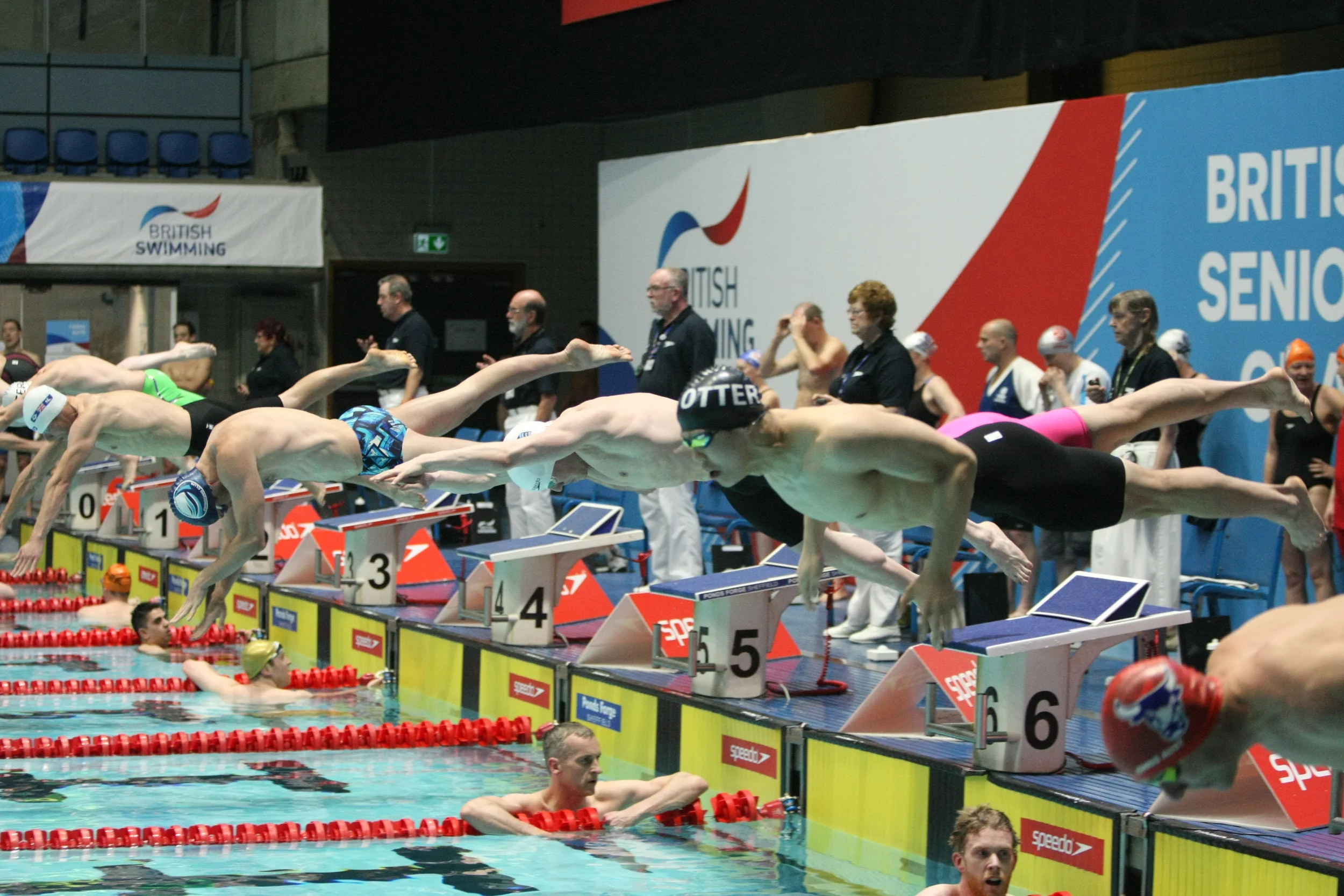 Kim dives in for the 100m Breast. 