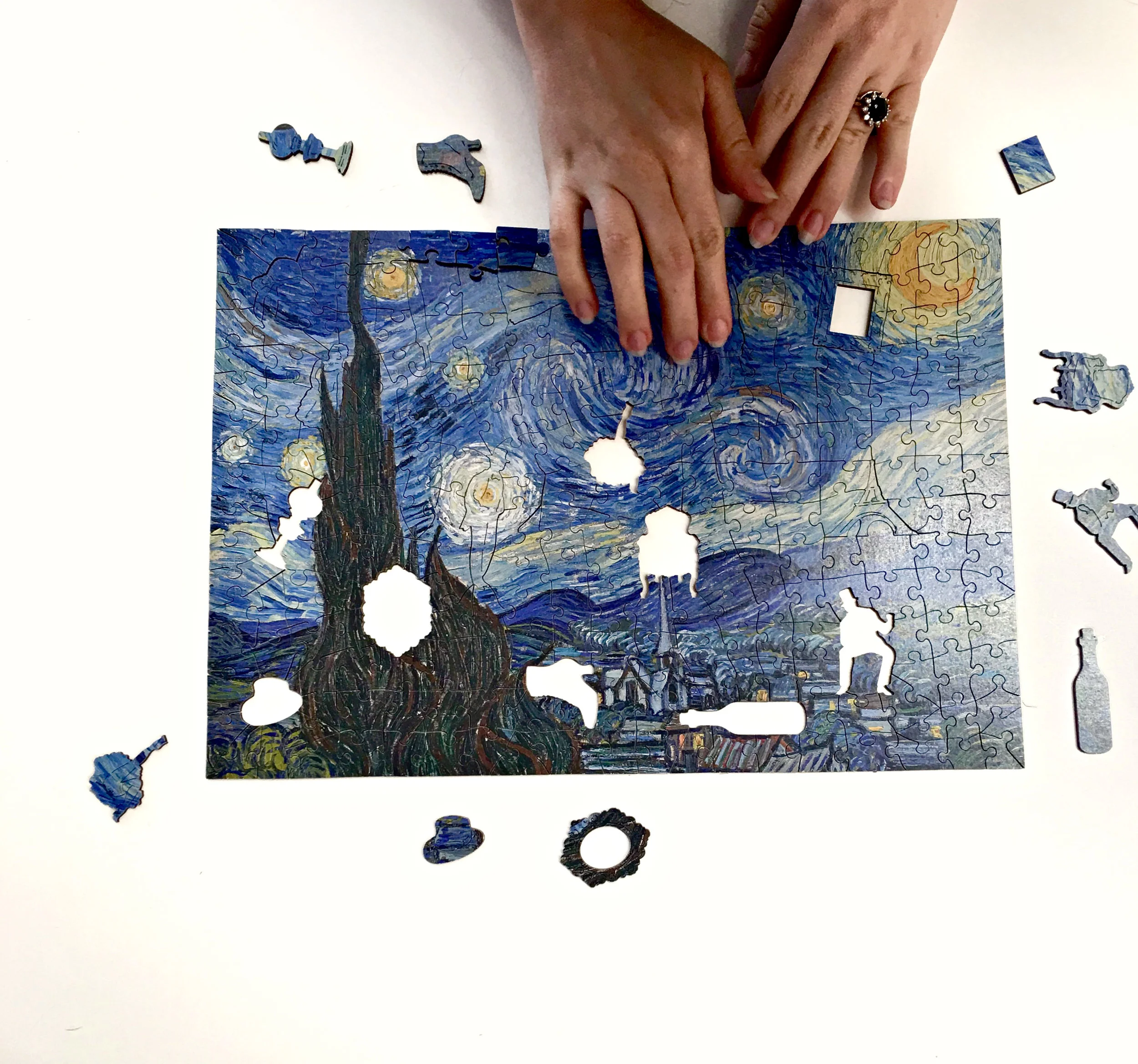 A whimsical puzzle featuring Van Gogh's Starry Night by Wentworth Wooden Puzzles. $55