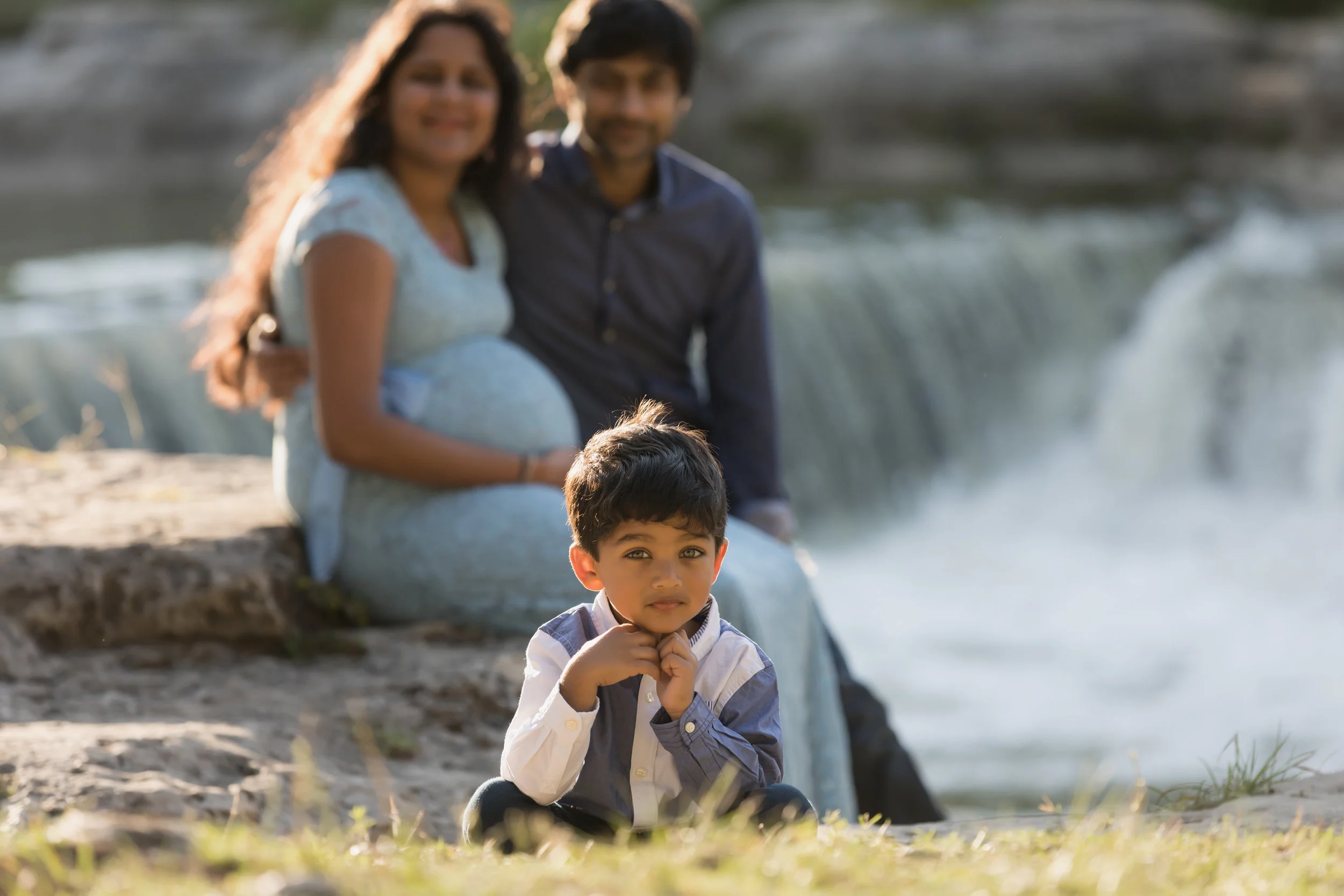 Soon-to-be big brother takes center stage during maternity portrait session at Memorial Park in Round Rock, Texas.