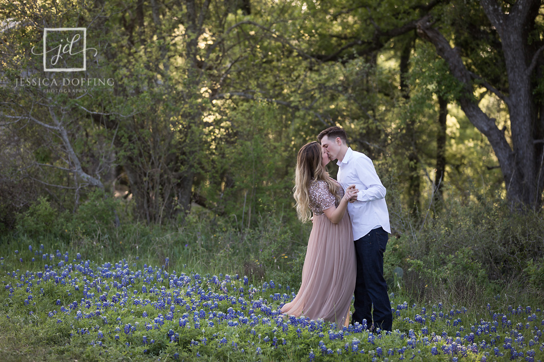 mckinney falls maternity couple bluebonnets