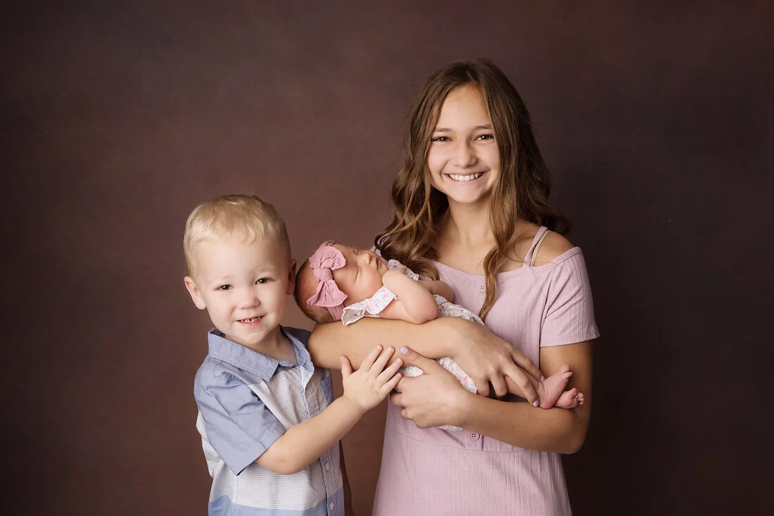 siblings brother and two sisters
