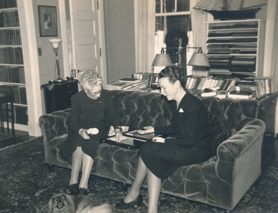 George and Alice Glessner’s home, The Ledge, in Bethlehem, New Hampshire. Sleep is shown at left over the table lamp.
