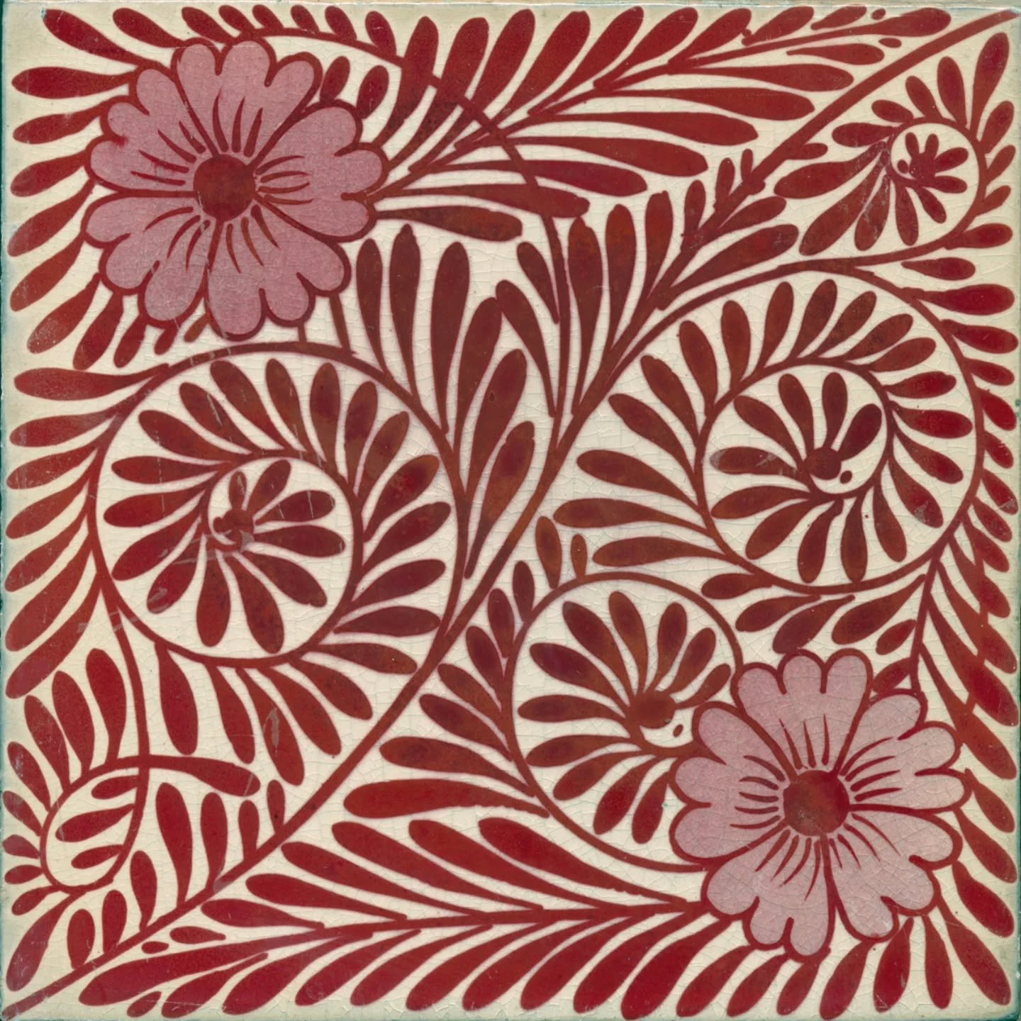 This week&rsquo;s Photo Friday shows a beautiful tile designed by the British ceramicist William De Morgan (1839-1917), one of dozens used to decorate the fireplace in the parlor guest room. 

The tile is an example of his lustreware, which features 