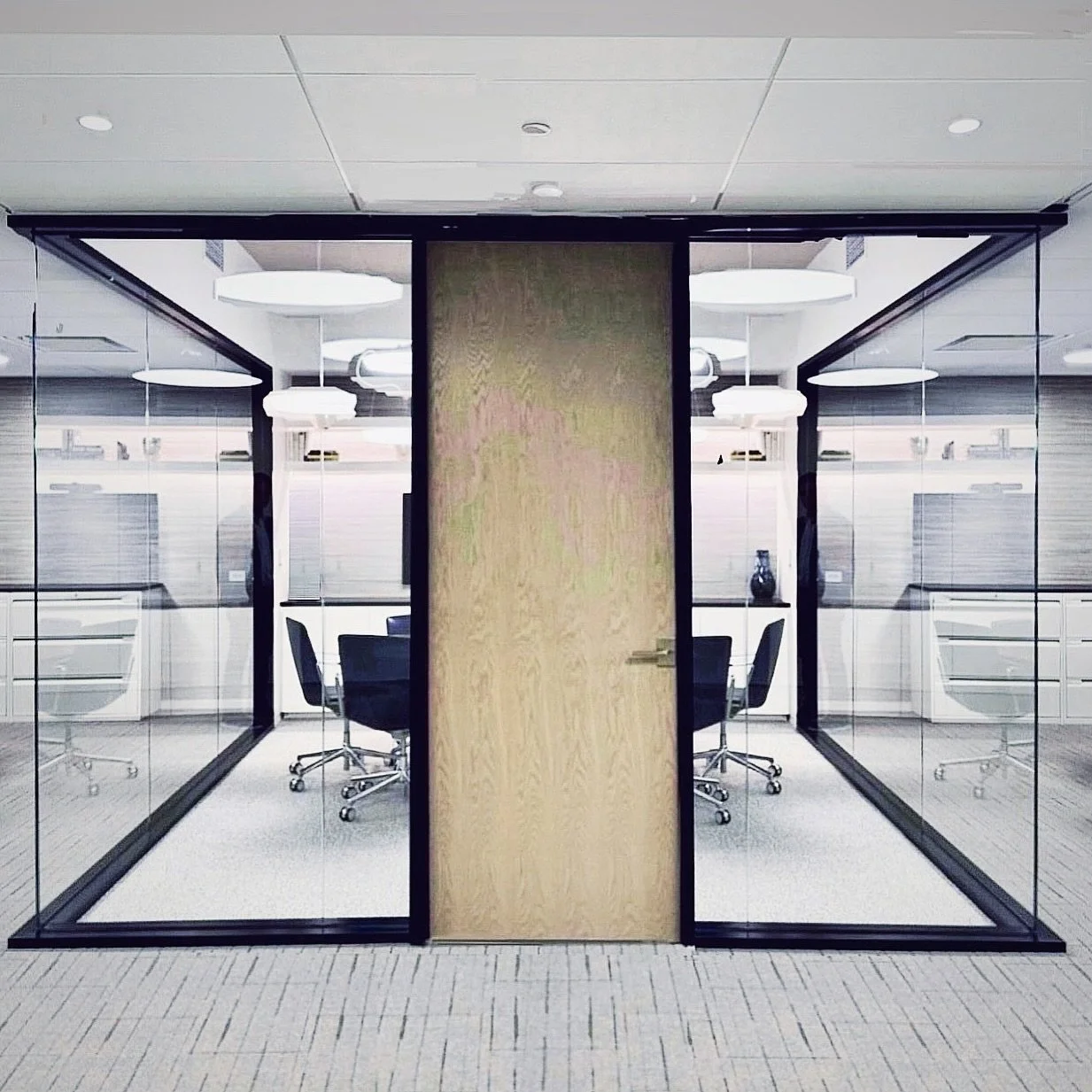 The built environment is the most subtle (and effective) way to convey the company&rsquo;s values.

When we studied the core principles of this financial institution, we noticed two words: financial transparency and client data privacy.

This confere