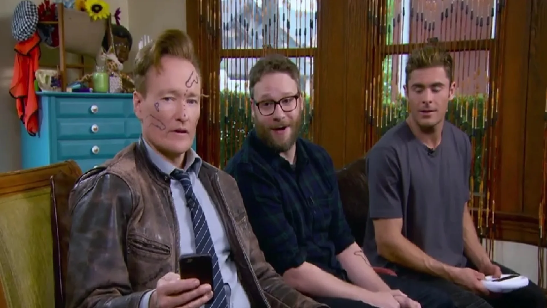 Seth Rogen And Zac Effron Take On Conan In MARIO KART 8