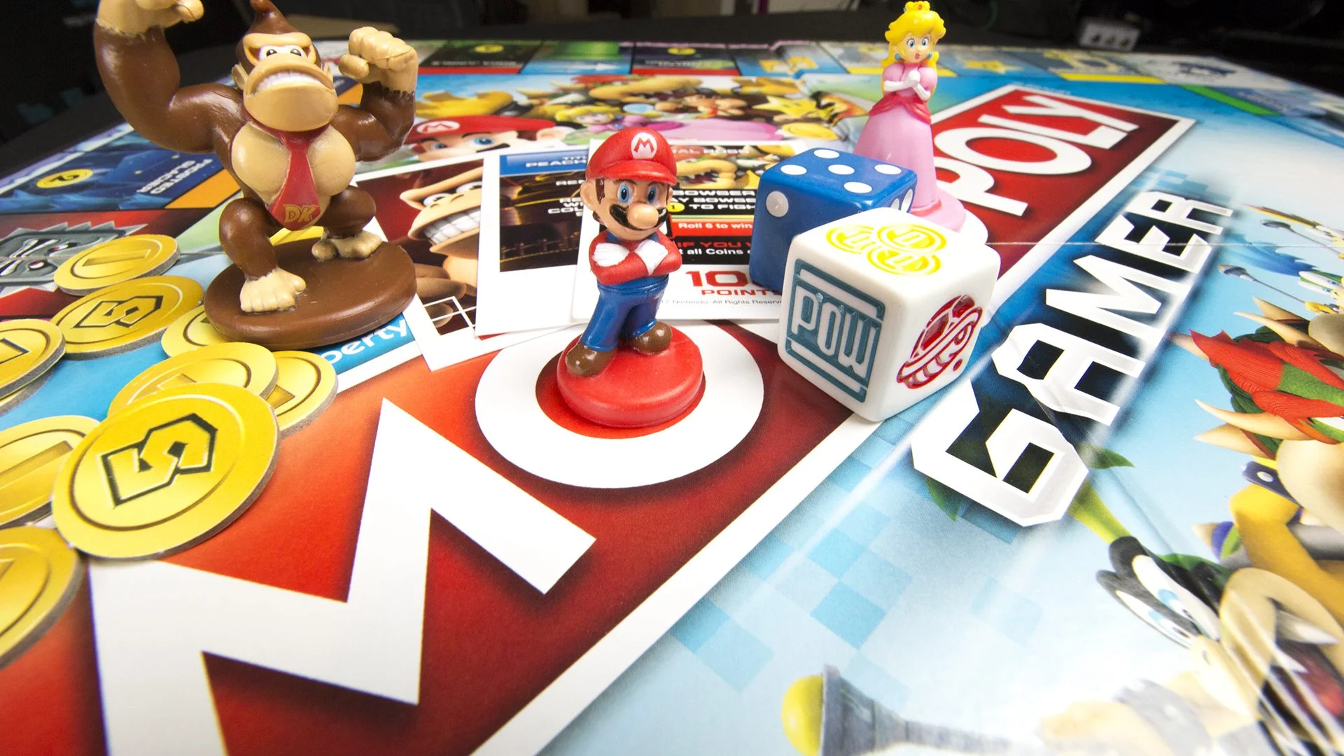 MONOPOLY GAMER Takes Mario And Throws Some Crazy Twists On The Traditional Board Game