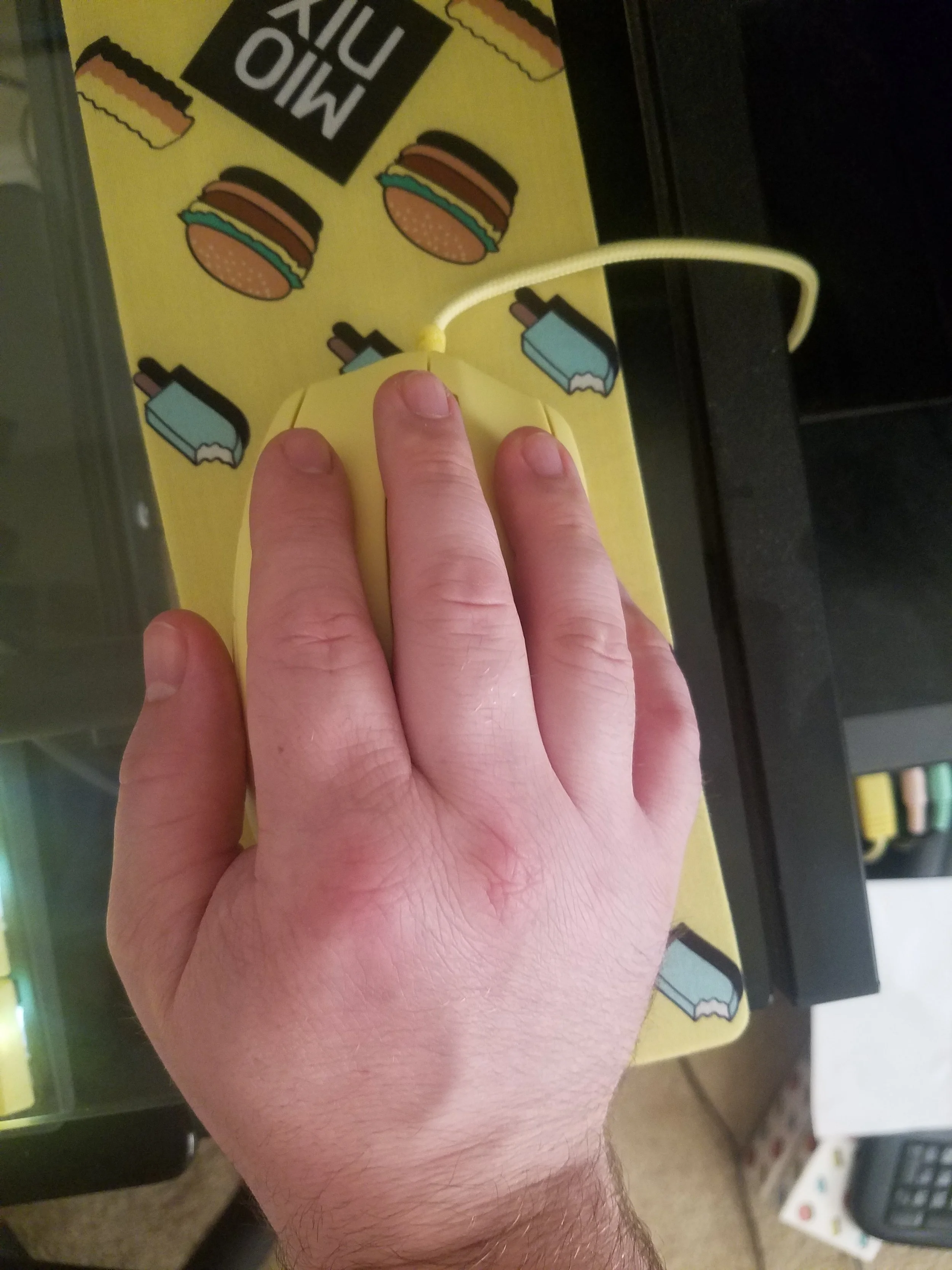 You can see that my small hand doesn't naturally fit on the correct buttons