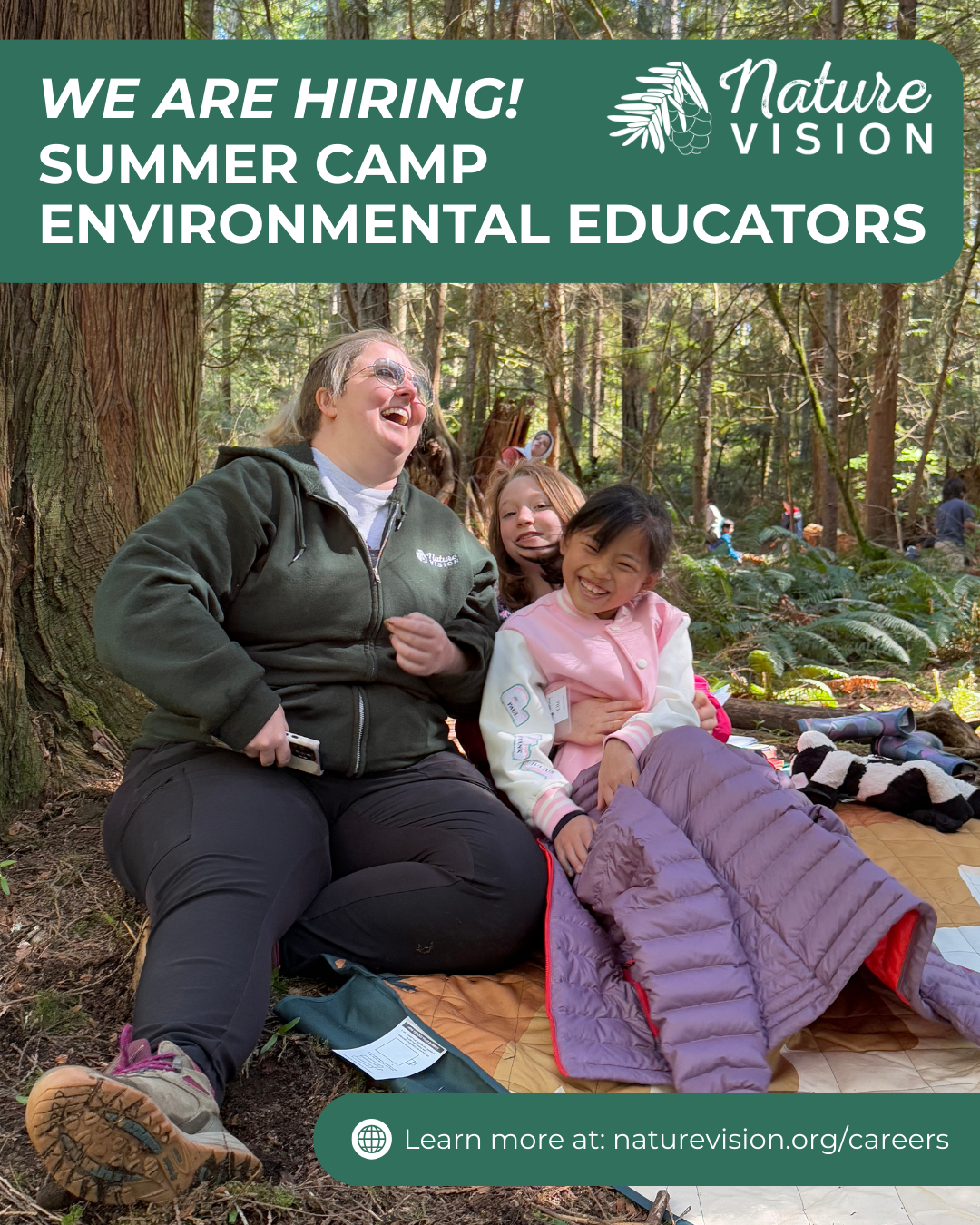 A Camp Educator sits on the ground in a forest with 2 students.  They are laughing together. Caption reads We are Hiring! Summer Camp Environmental Educators with the Nature Vision Logo and the website link naturevision.org/careers.