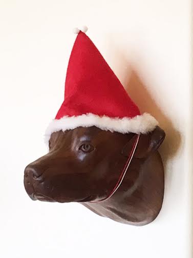 Hand carved and solid wood bust of dog