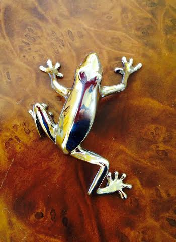 Polished steel frog cabinet pull from Martin Pierce hardware Photo Doug Hill
