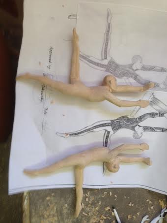 Carvings placed next to preliminary sketch by Martin Pierce Hardware Los Angeles CA 90016