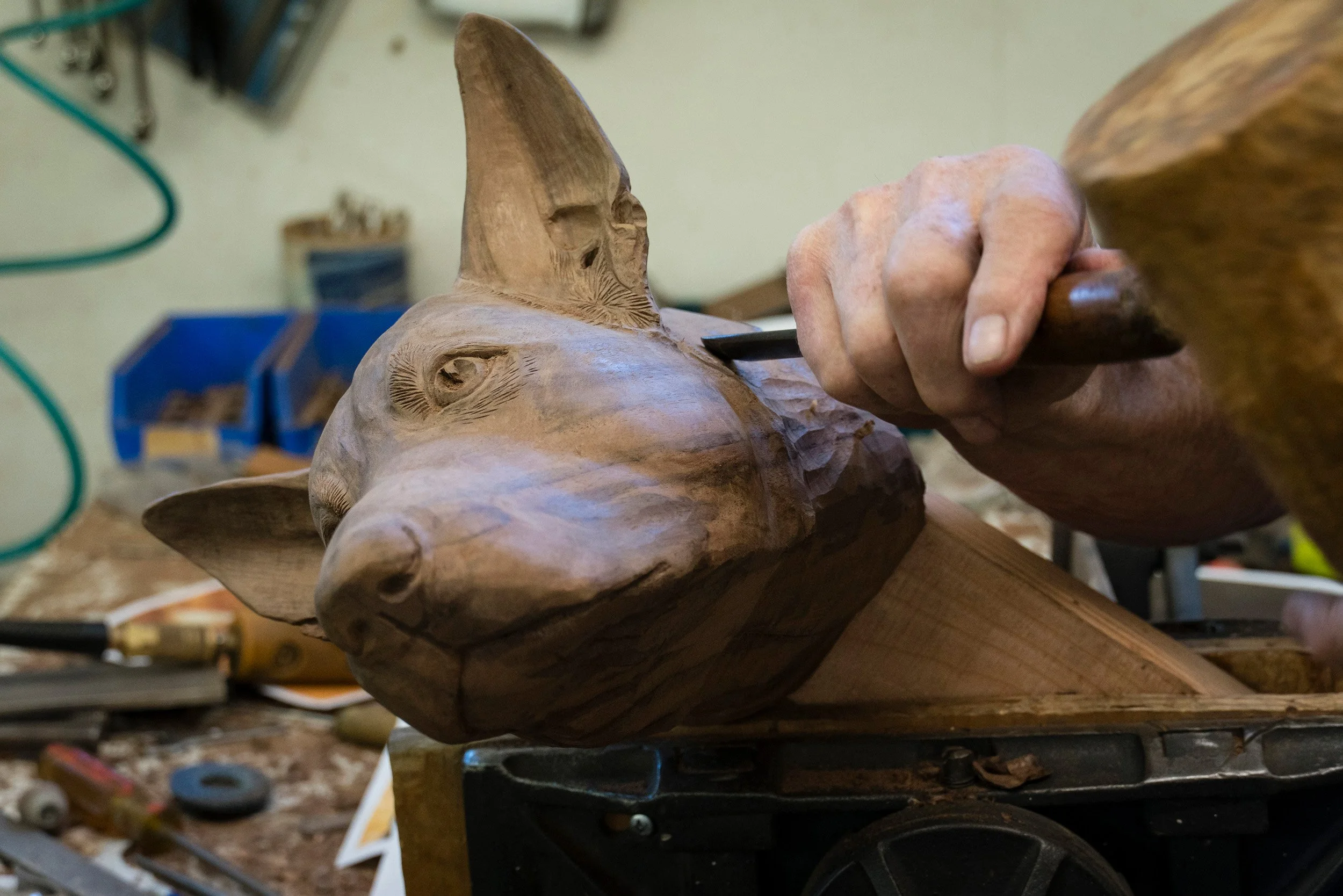 Carving the jaw and neck of the Doug dog portrait in walnut