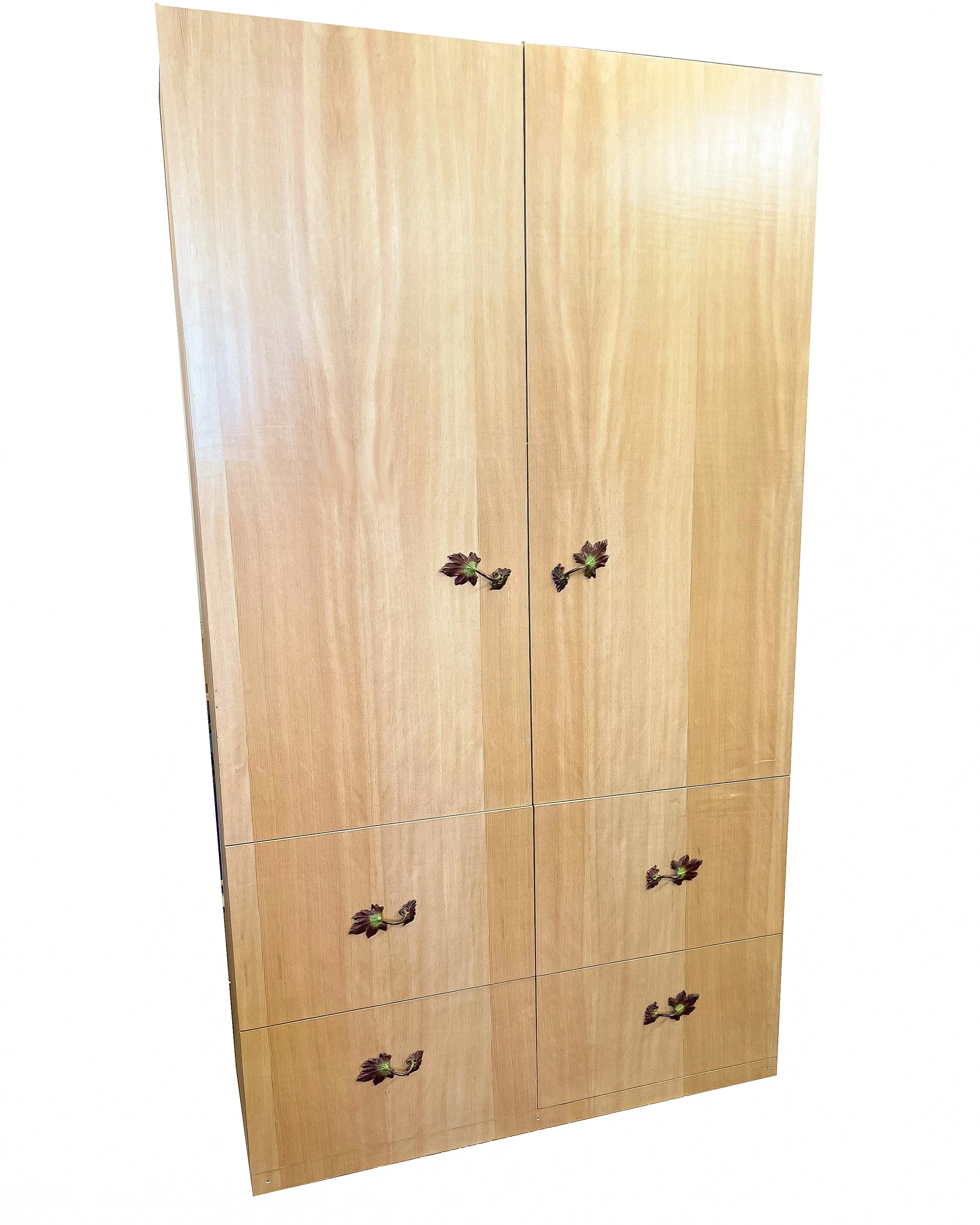 Douglas fir armoire with handcrafted bronze vine cabinet pulls featuring layered red and green hot patina finish.