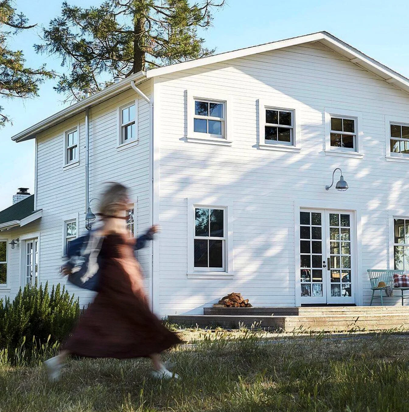 Girl Running in front of Farm.jpg