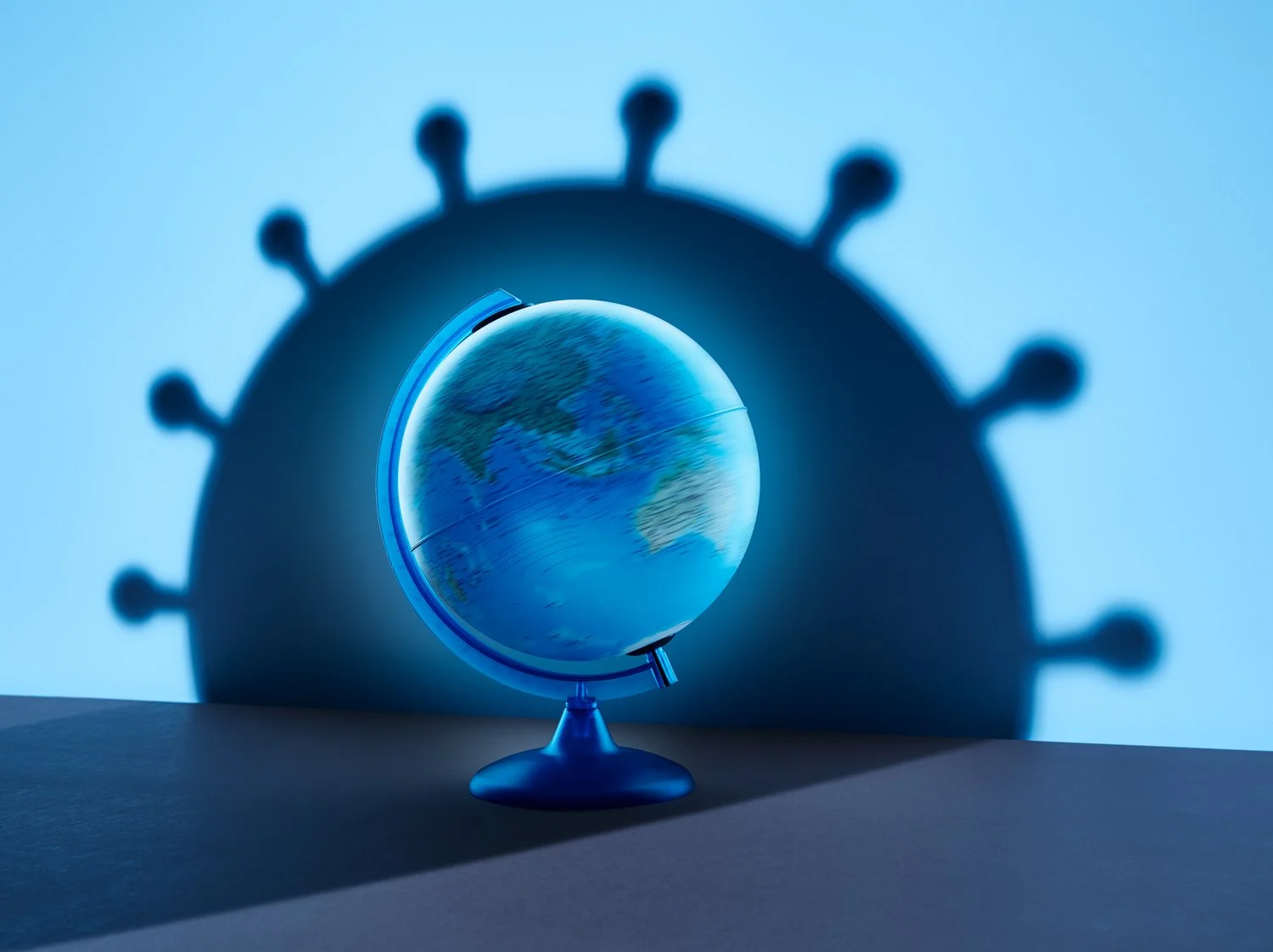 Covid_shadow_globe_comp_lscape FIN HR.jpg