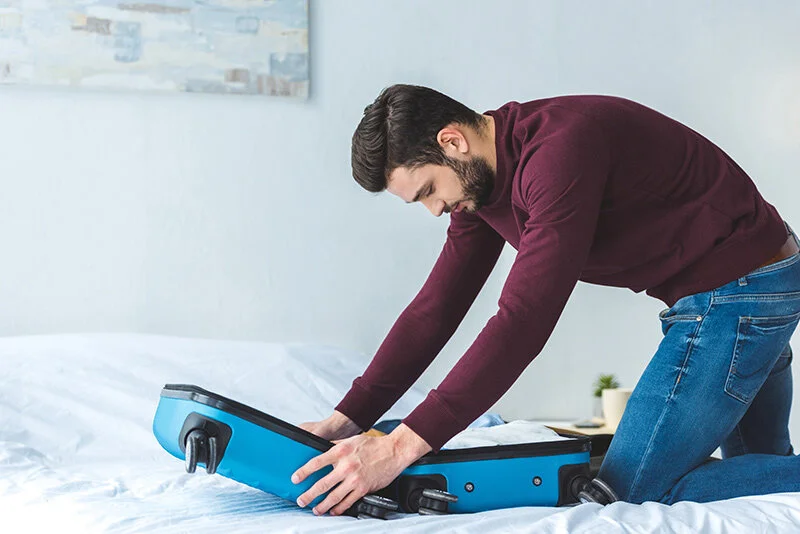 Man Packing for Beachside Vacation Hilariously Includes Running Gear
