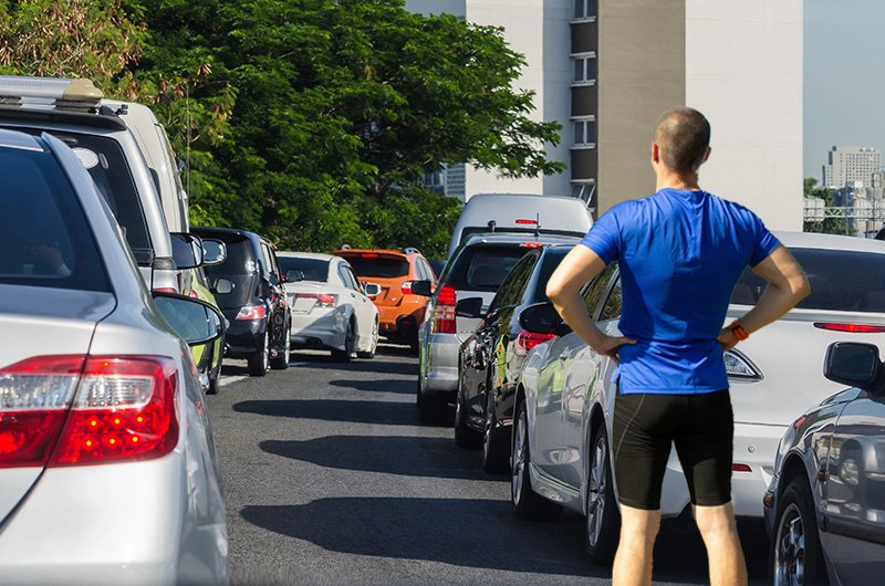 Local Runner Frustrated to Be Stuck Again in Rush Hour Traffic