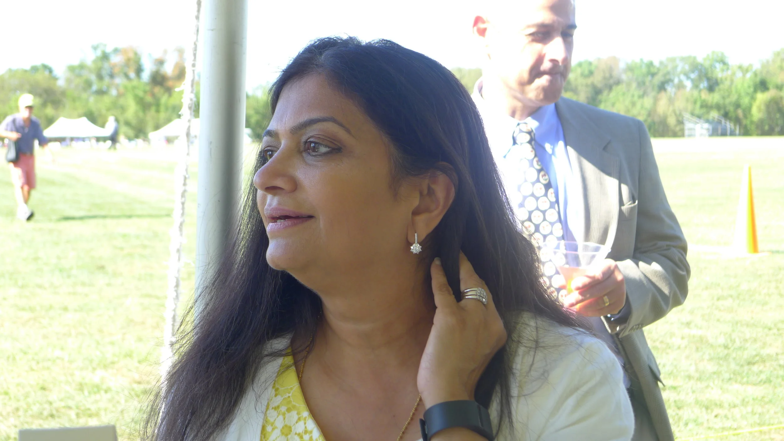 Arti models our elegant, yet casual diamond drop "flower" earrings