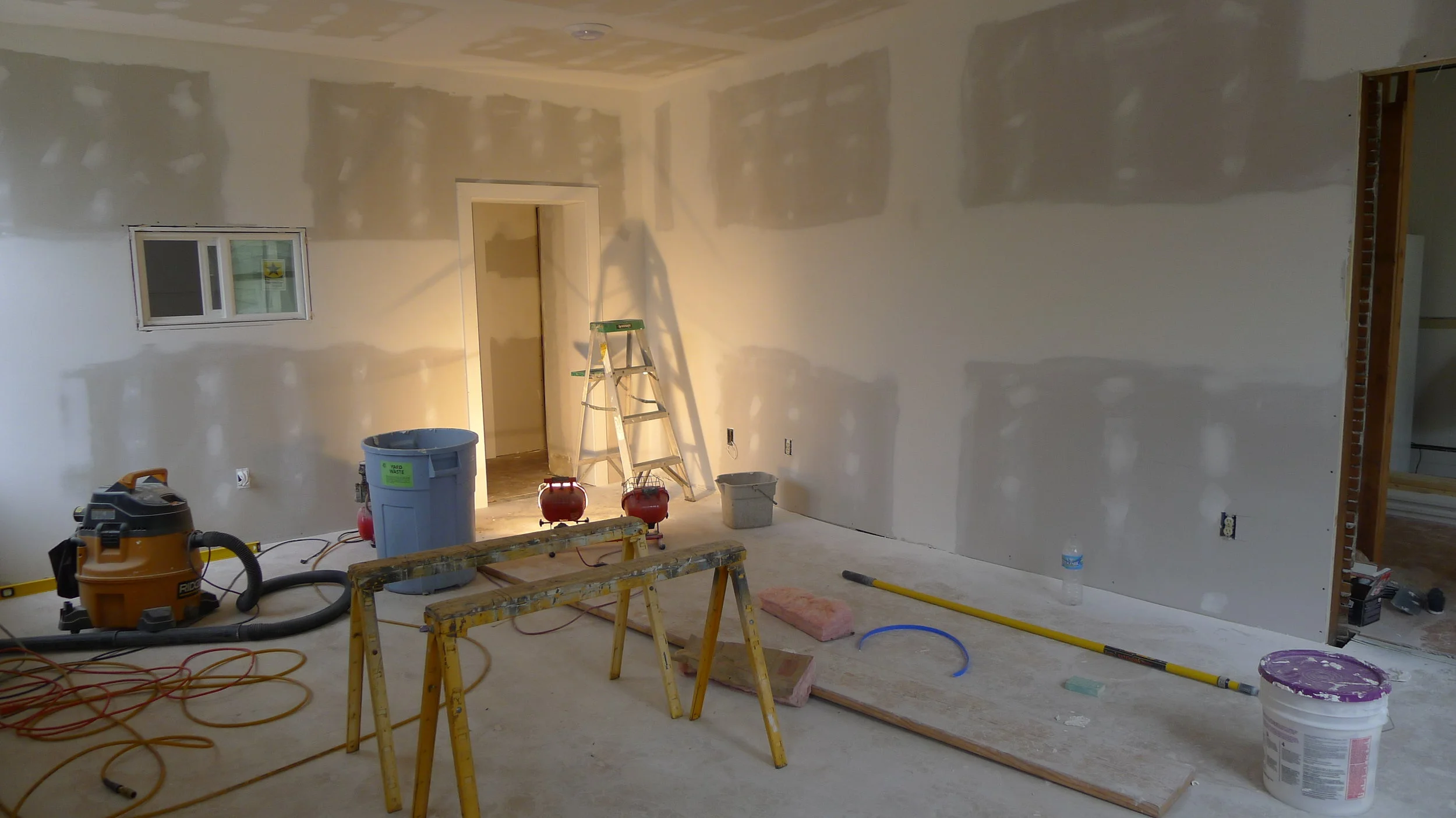 You never know what you are going to find in old buildings - a simple "let's just paint the existing walls" gone pretty much astray.