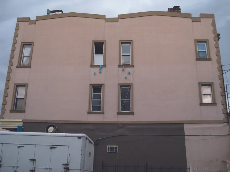 Apt 219 is crying I , 2015 Photograph of installation in apartment windows 4 x 6 inches
