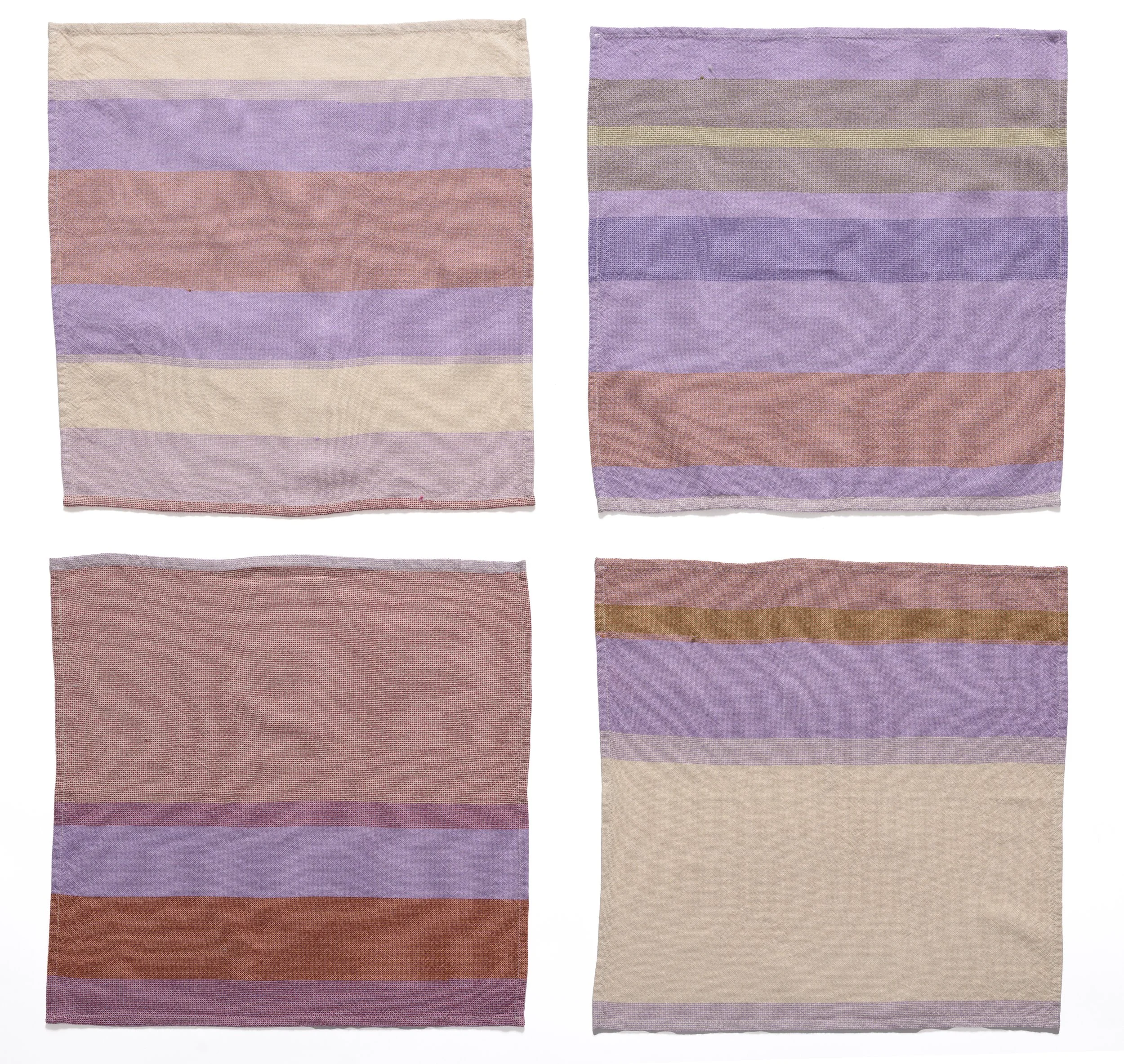 Grid of 4 multi-colored napkins with variegated striping on white background