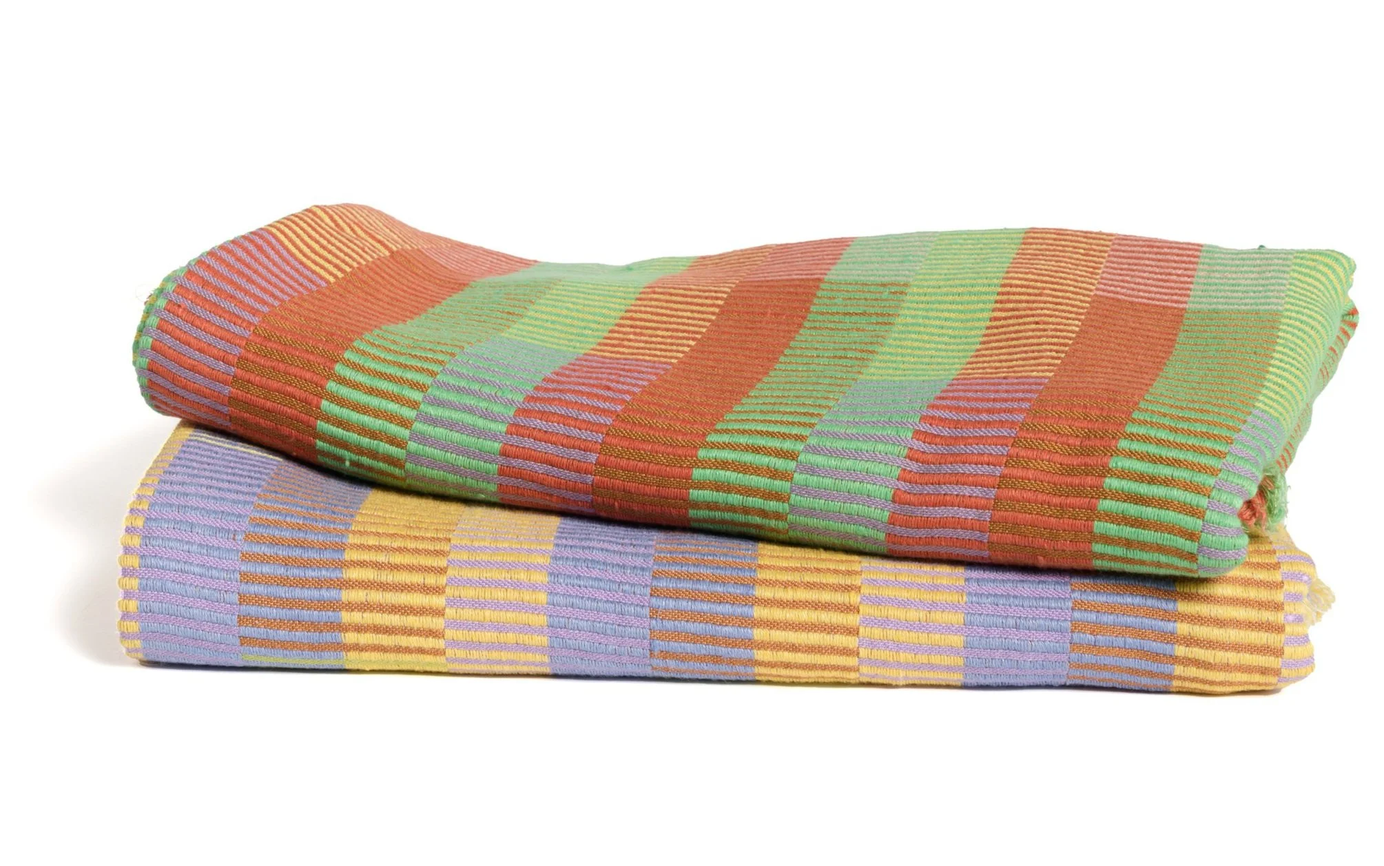 Stack of multicolored blankets folded on a white background