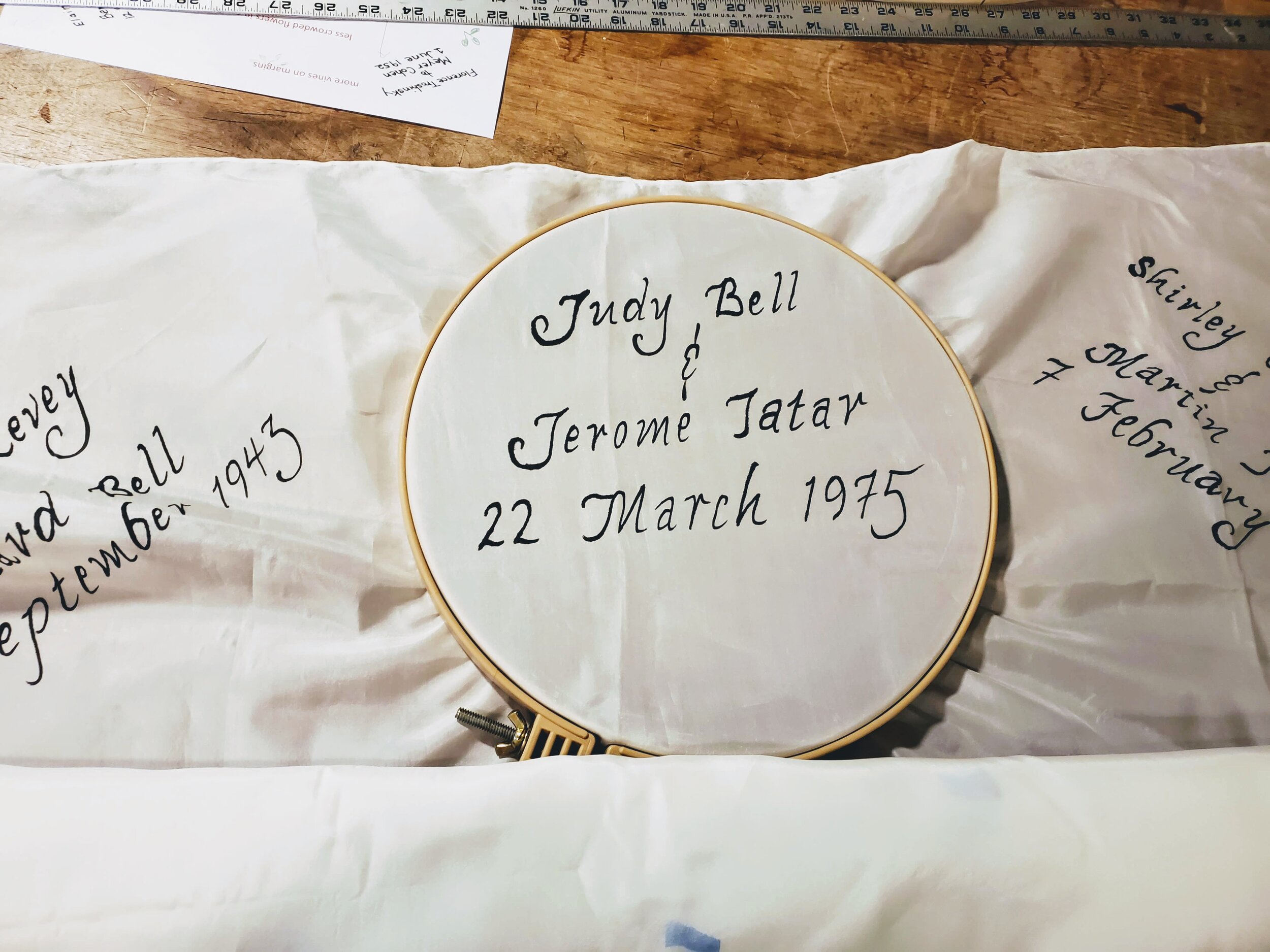 The silk must be stretched taut so I can paint the lettering, so I used a large embroidery hoop.