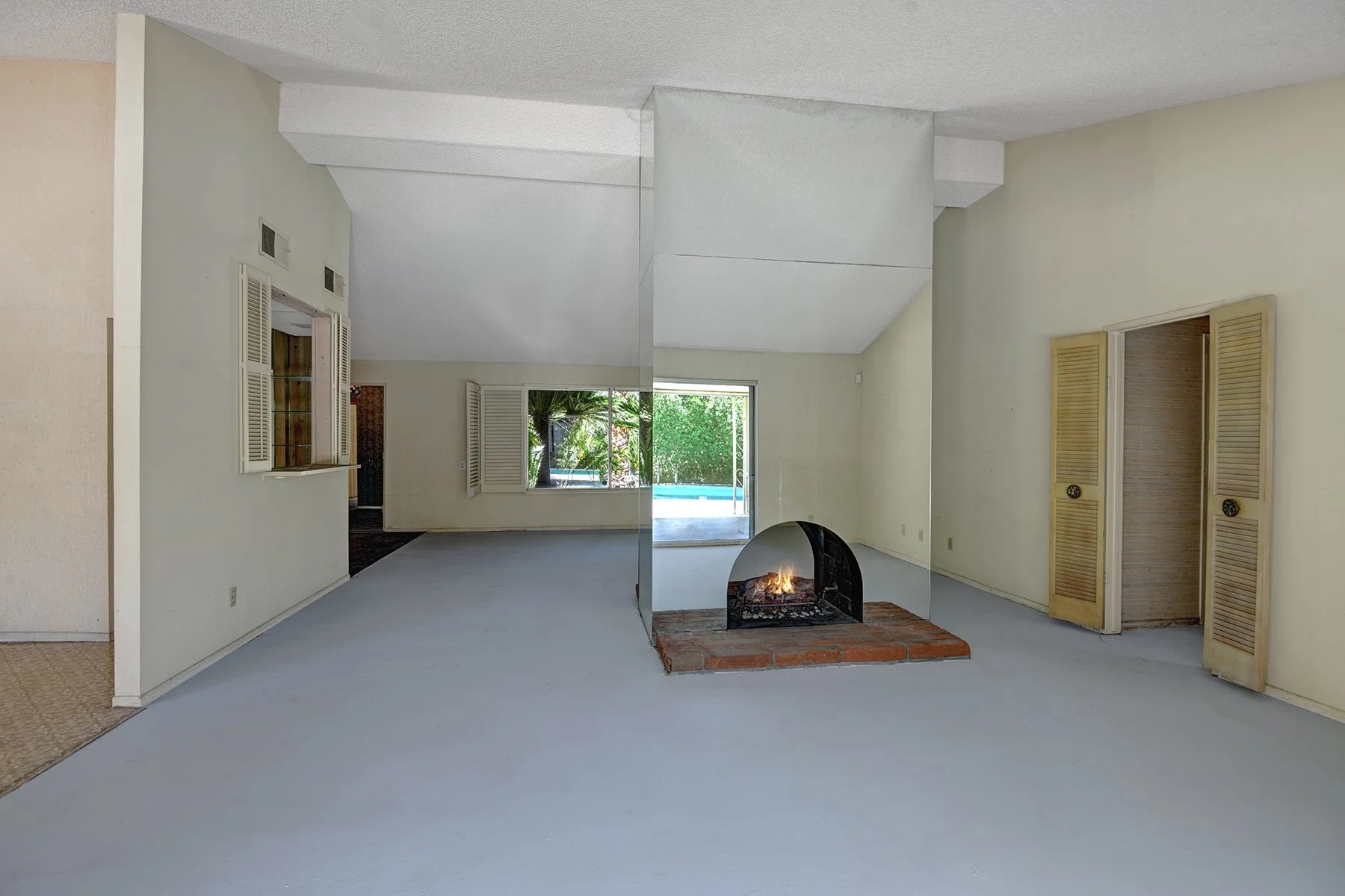 DINING REVERSE TO LIVING WITH FIREPLACE MLS.jpg