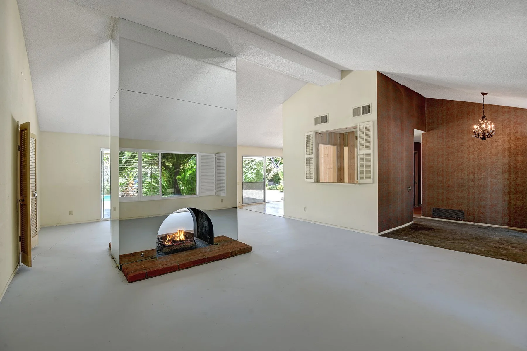 LIVING ANGLED IN TO ENTRY AND DINING MLS.jpg
