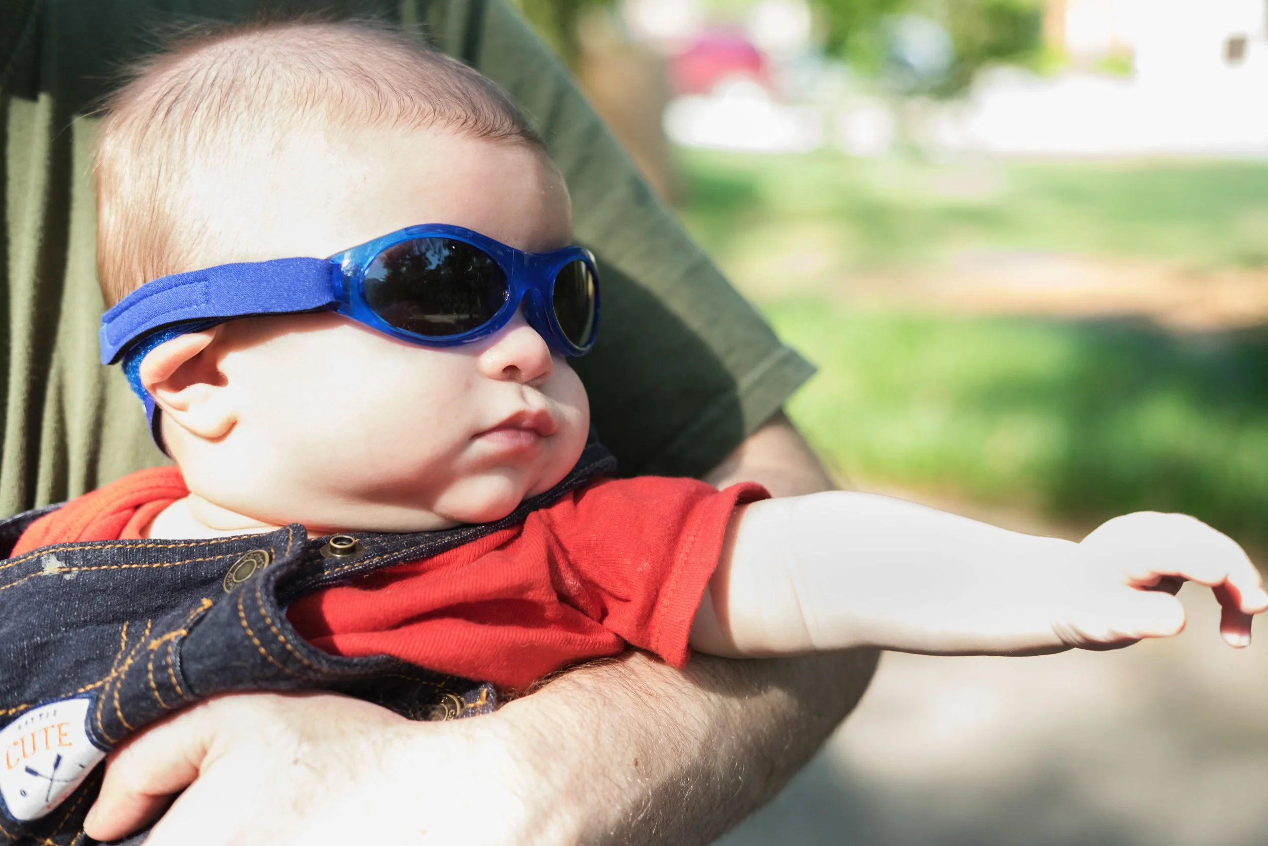 Overexposed with lots of blown highlights but I'm looking past all of that because......baby in sunglasses. ;) 