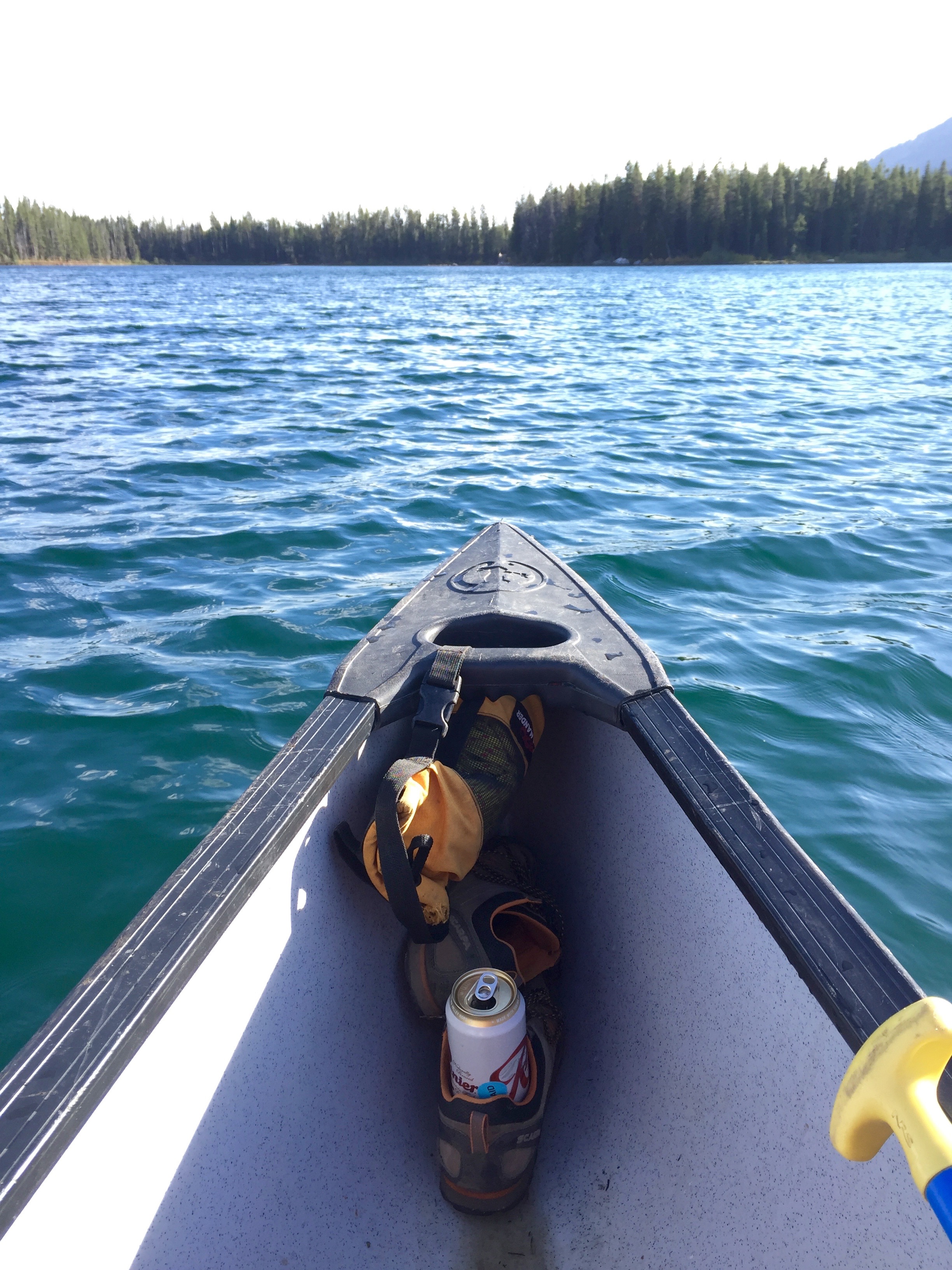 We borrowed a canoe from Kate and Mark to fetch ours, since our route started up a different canyon. We stashed beers in the stream, so had ice cold brews for the ride back!