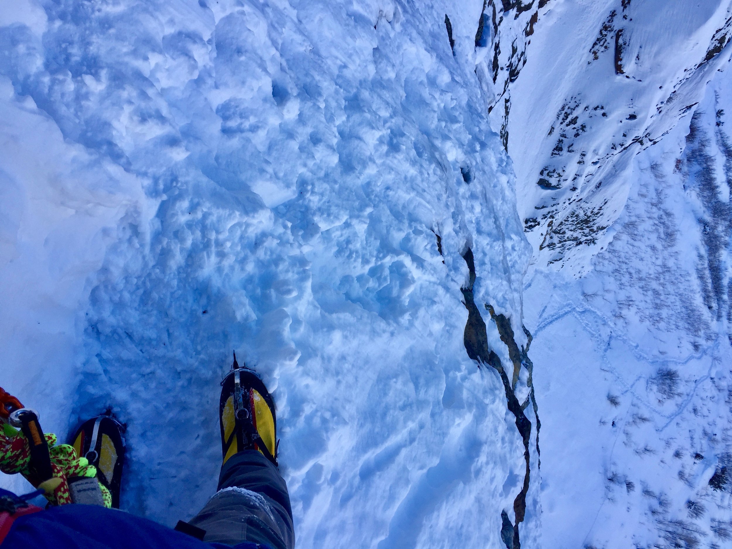 Looking down from the second belay to our tracks about 400' below.