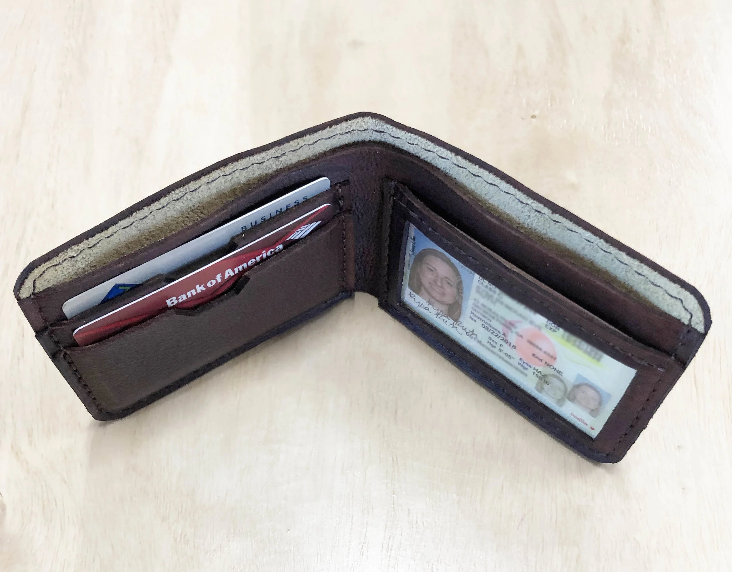 Billfold wallet I designed and patterned. Clear ID window, two card slots, and cash pocket.