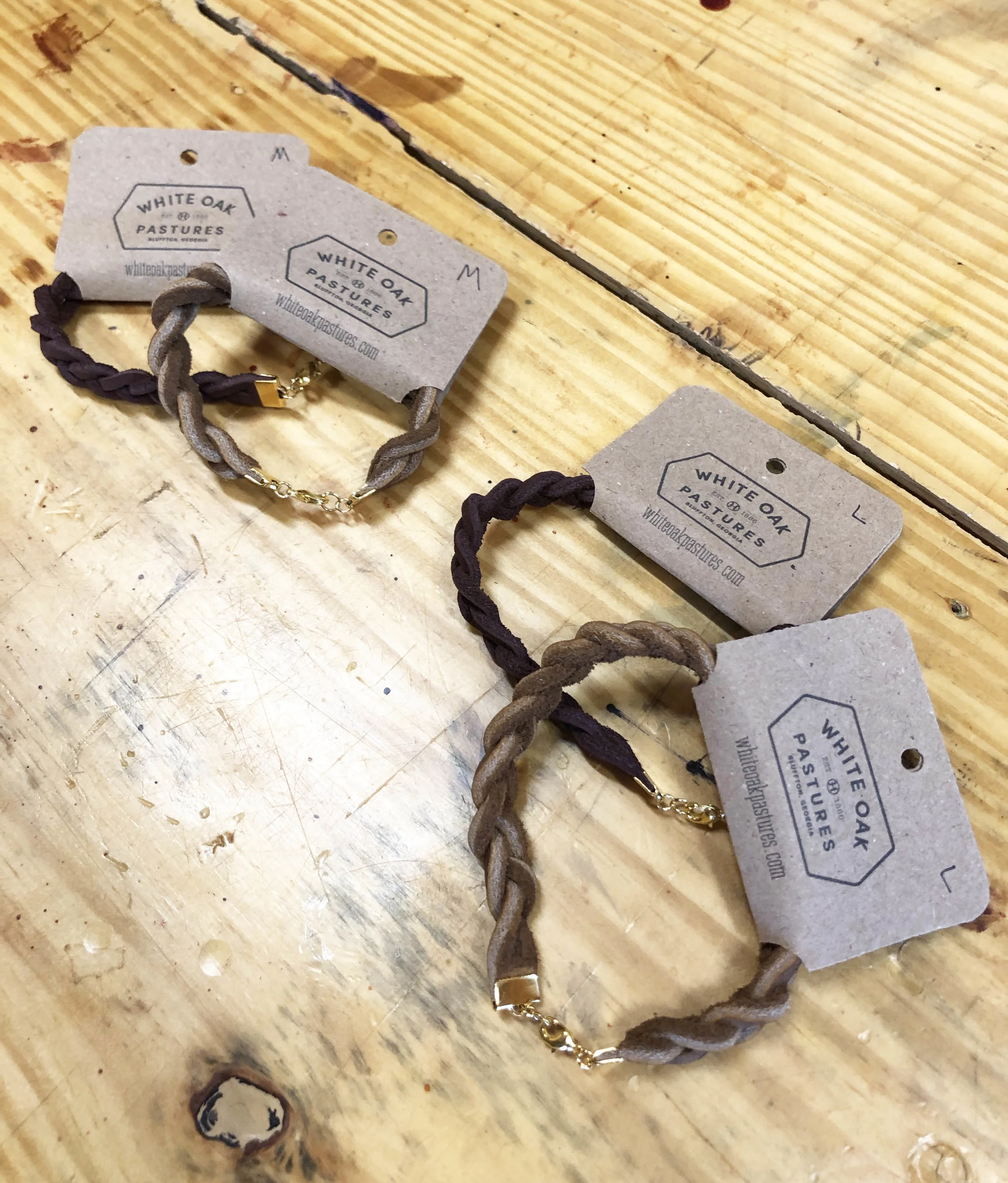 Braided leather bracelets that I designed and sourced packaging for.