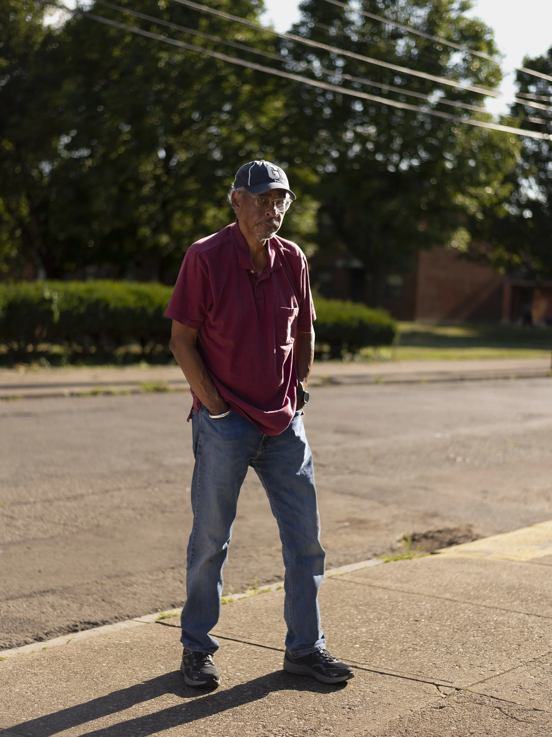 Melvin Grier on the street where he grew up in Cincinnati, OH