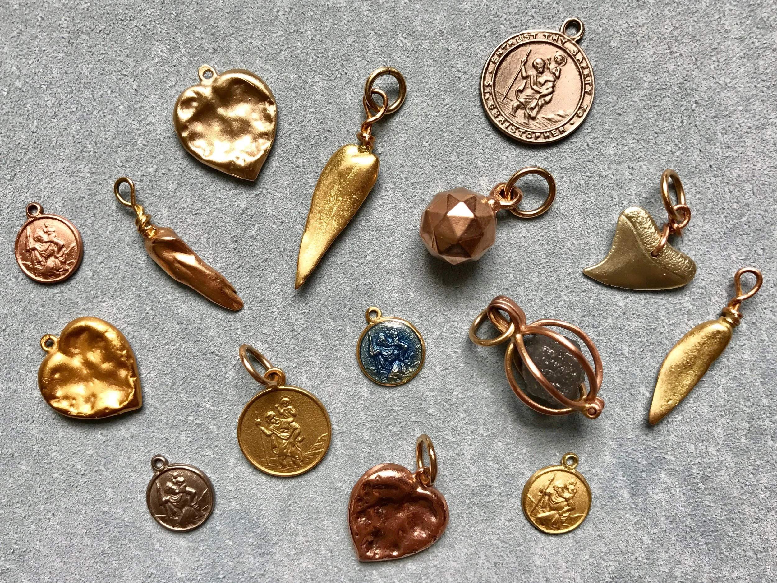 COLLECTION OF CHARMS & PENDANTS