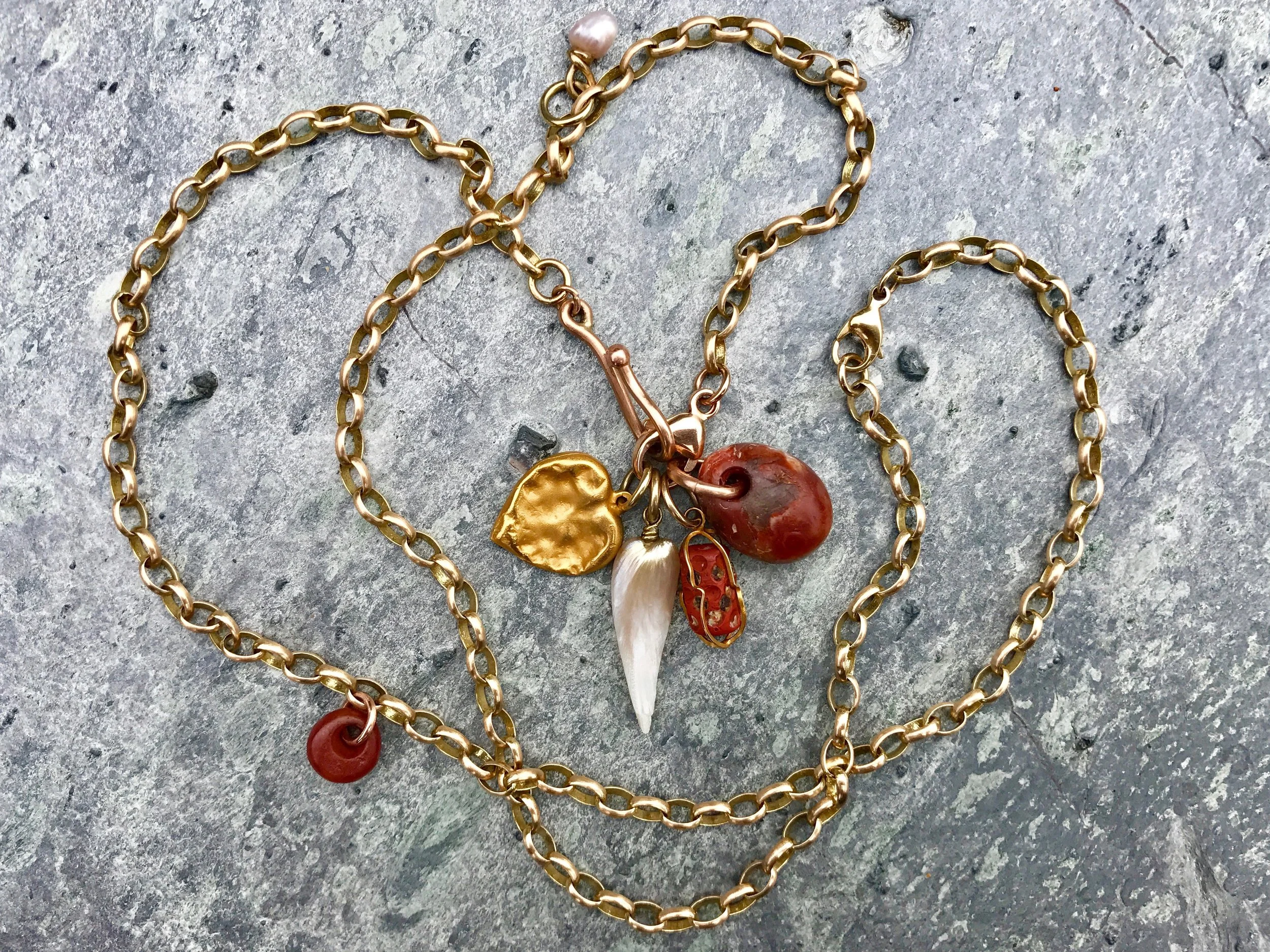 BELCHER CHAIN WITH CHEWED HEART, MISSISSIPPI PEARL, TRADE BEAD BASKET AND NEOLITHIC BEAD PENDANT